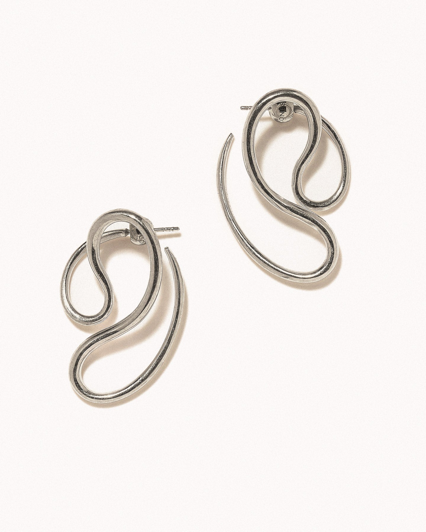 P continua earrings