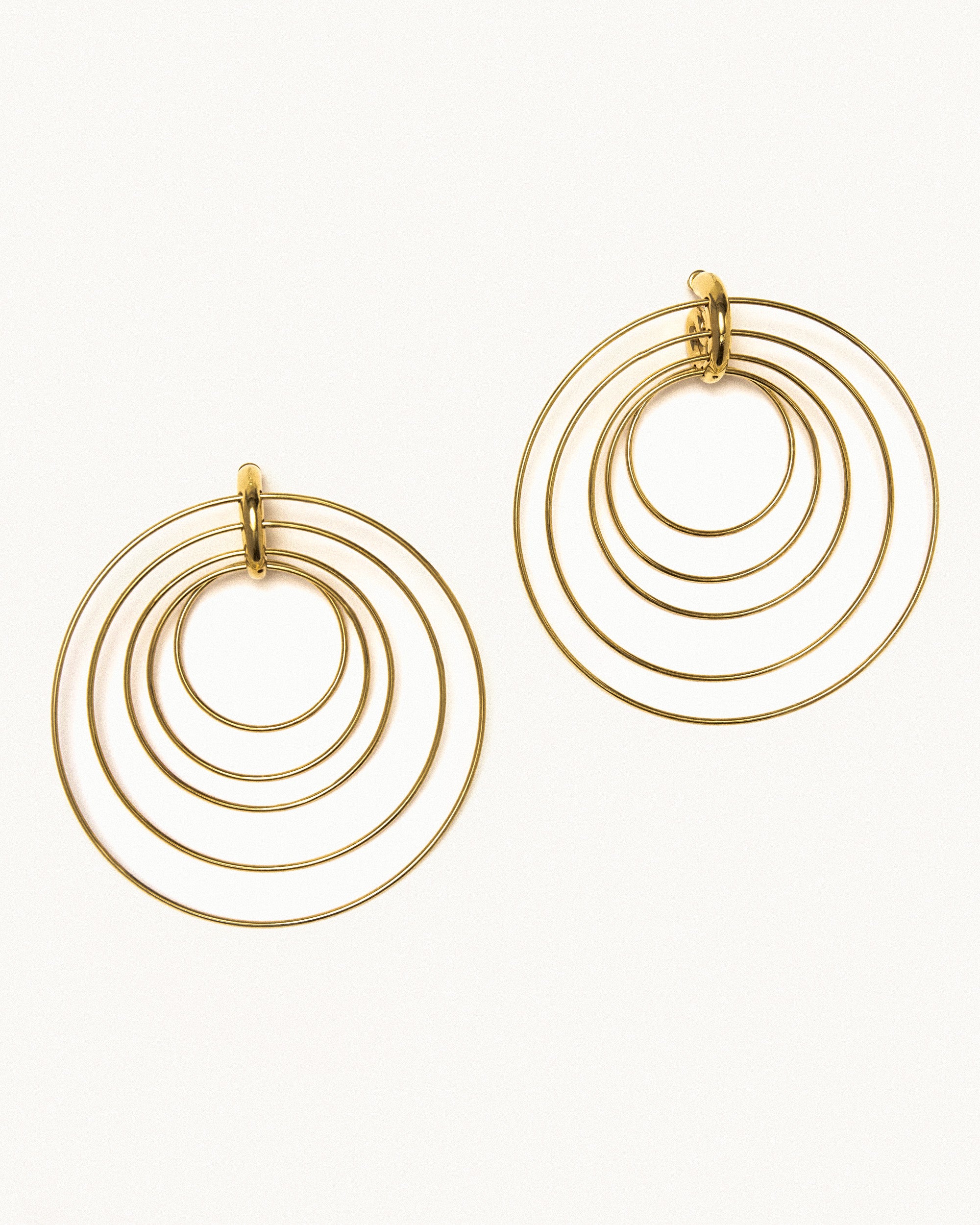 Pierced serpent hoops large