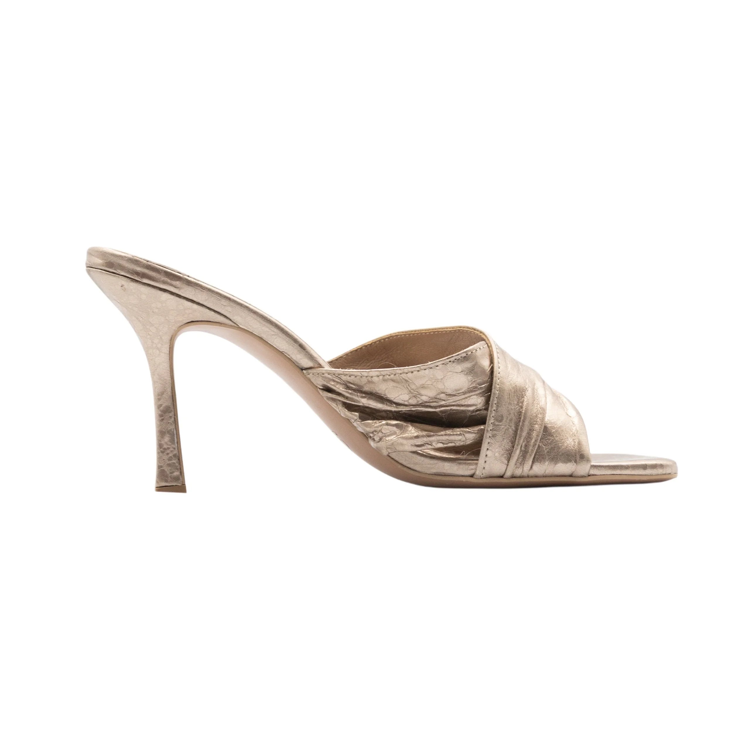 Famous heel in gold