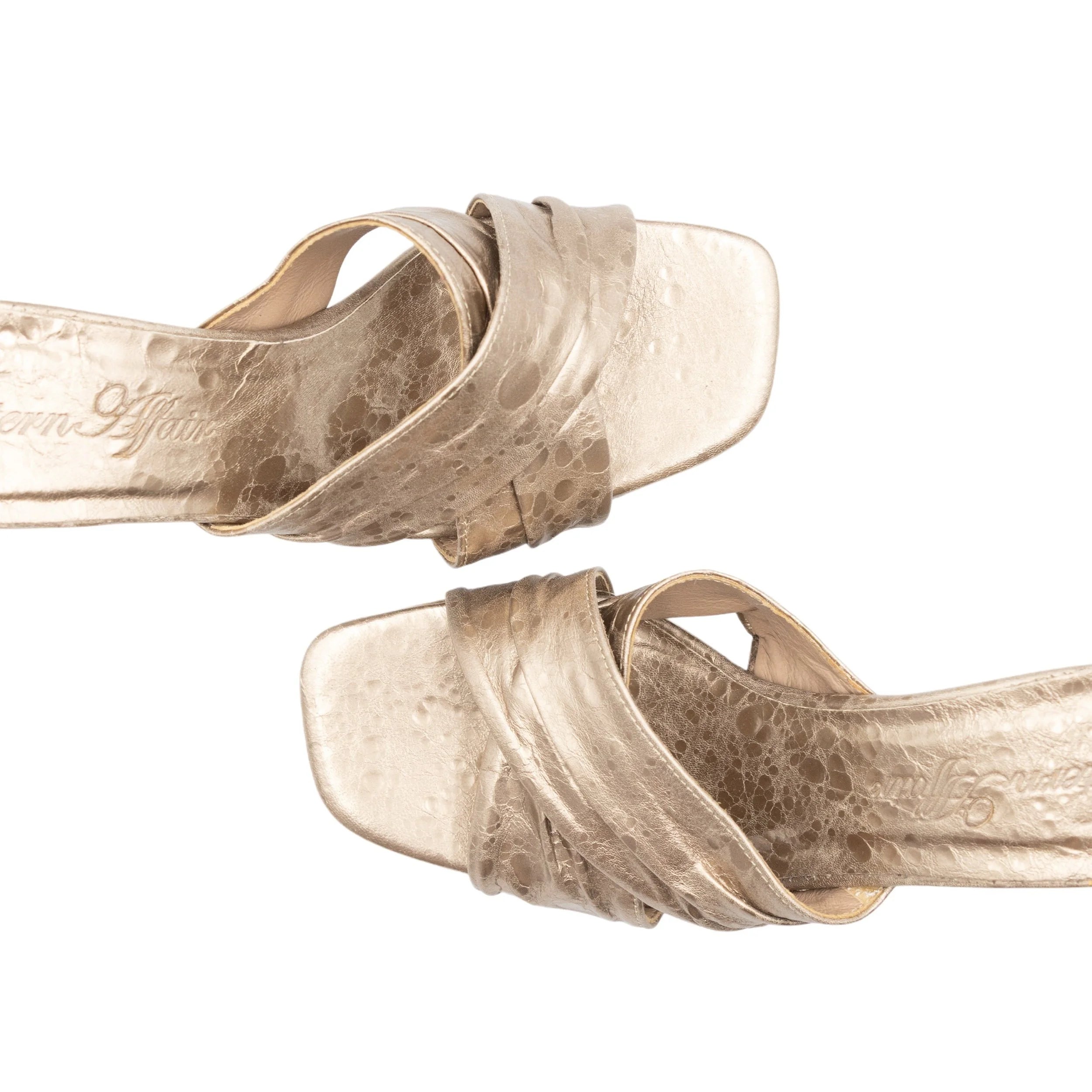 Famous heel in gold
