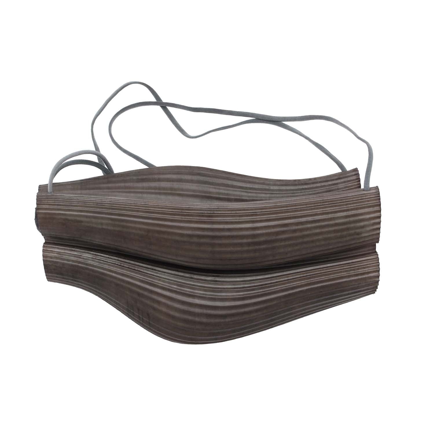 Rubber sling bag, dyed