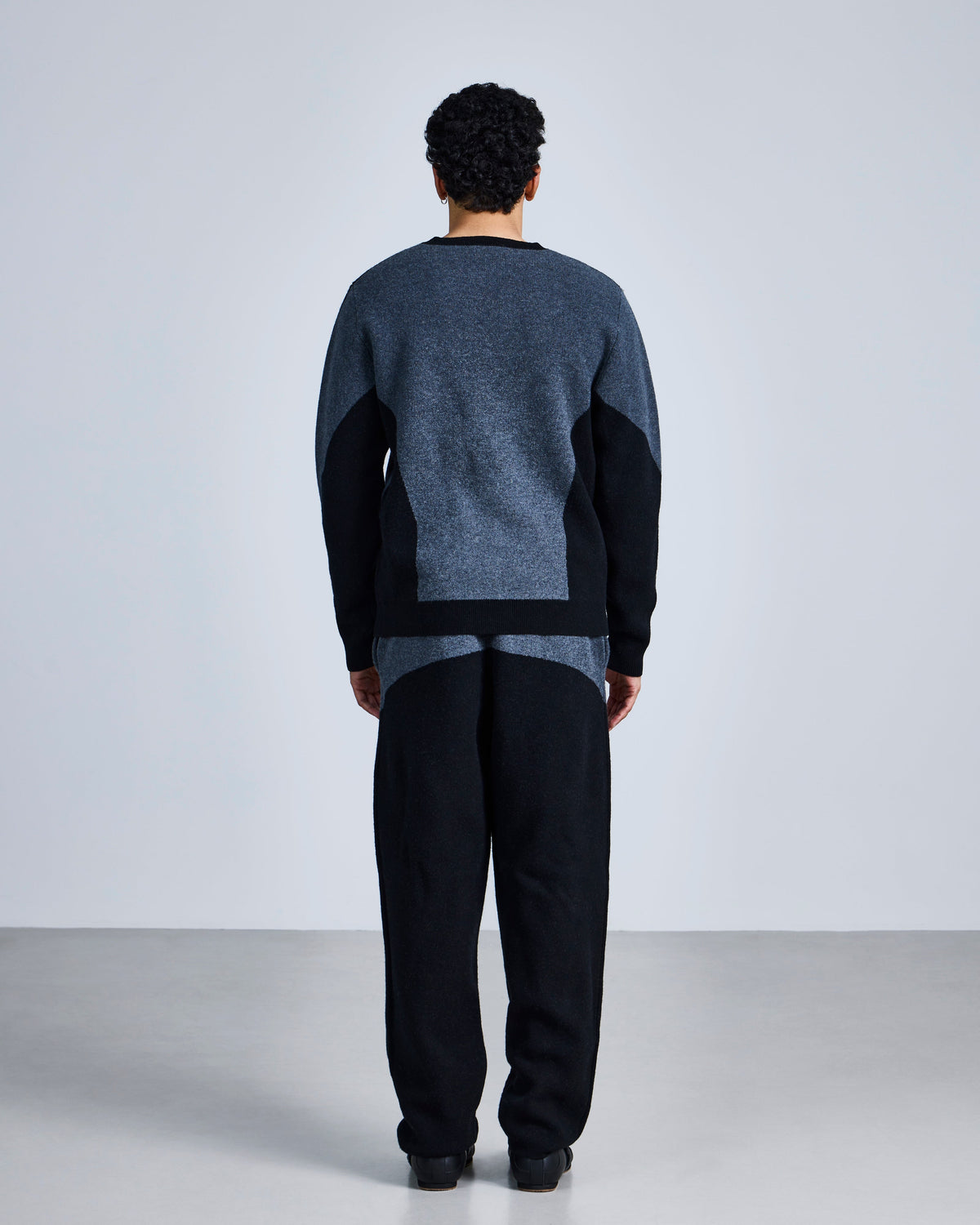 Knitted 'embrace' jumper