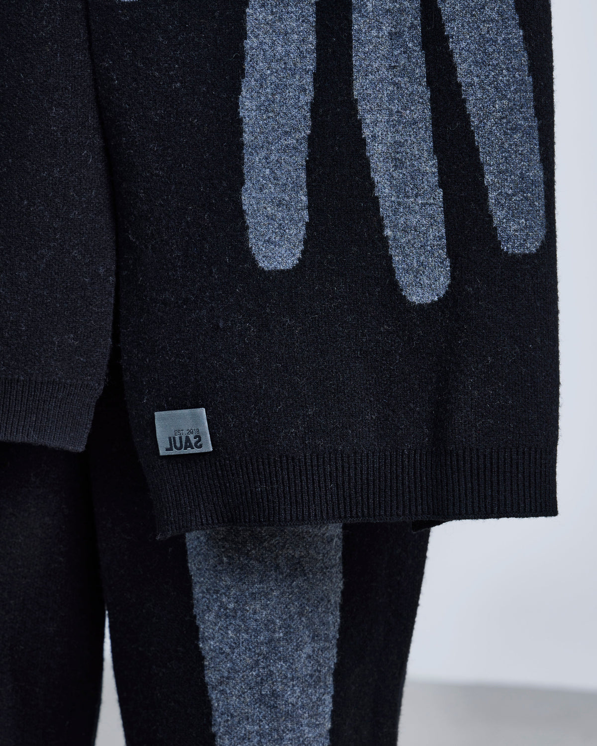 Knitted 'embrace' scarf