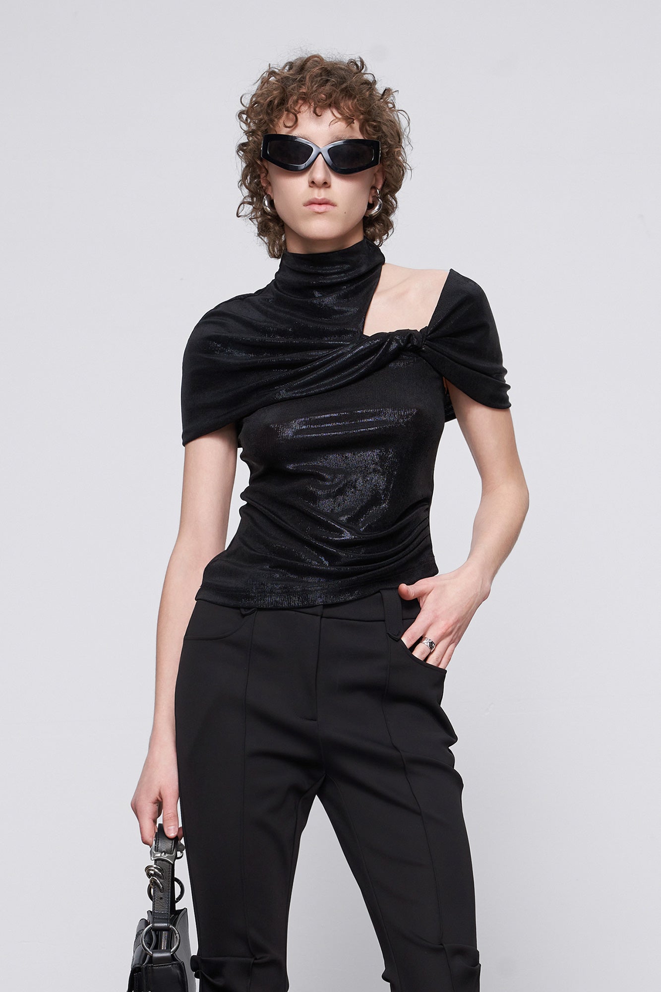 Asymmetric twisted four star top