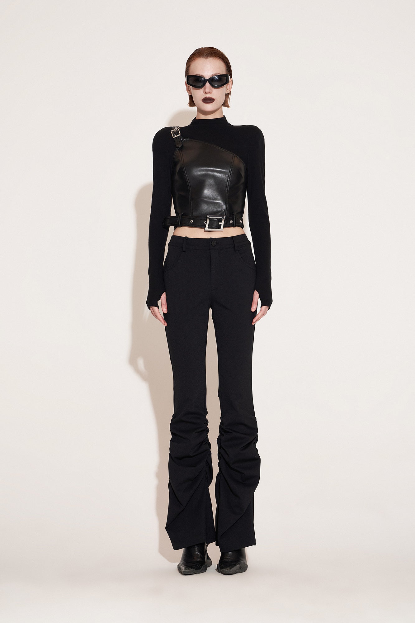 Pleated slim-fit trousers