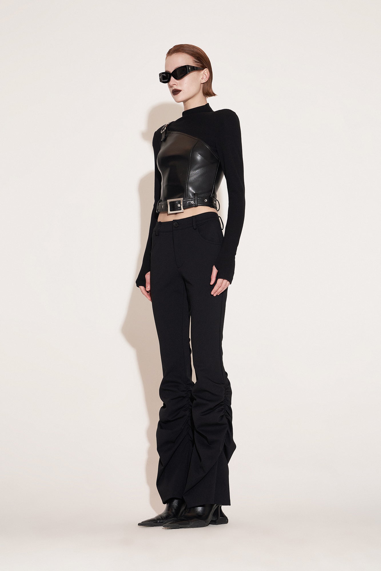 Pleated slim-fit trousers