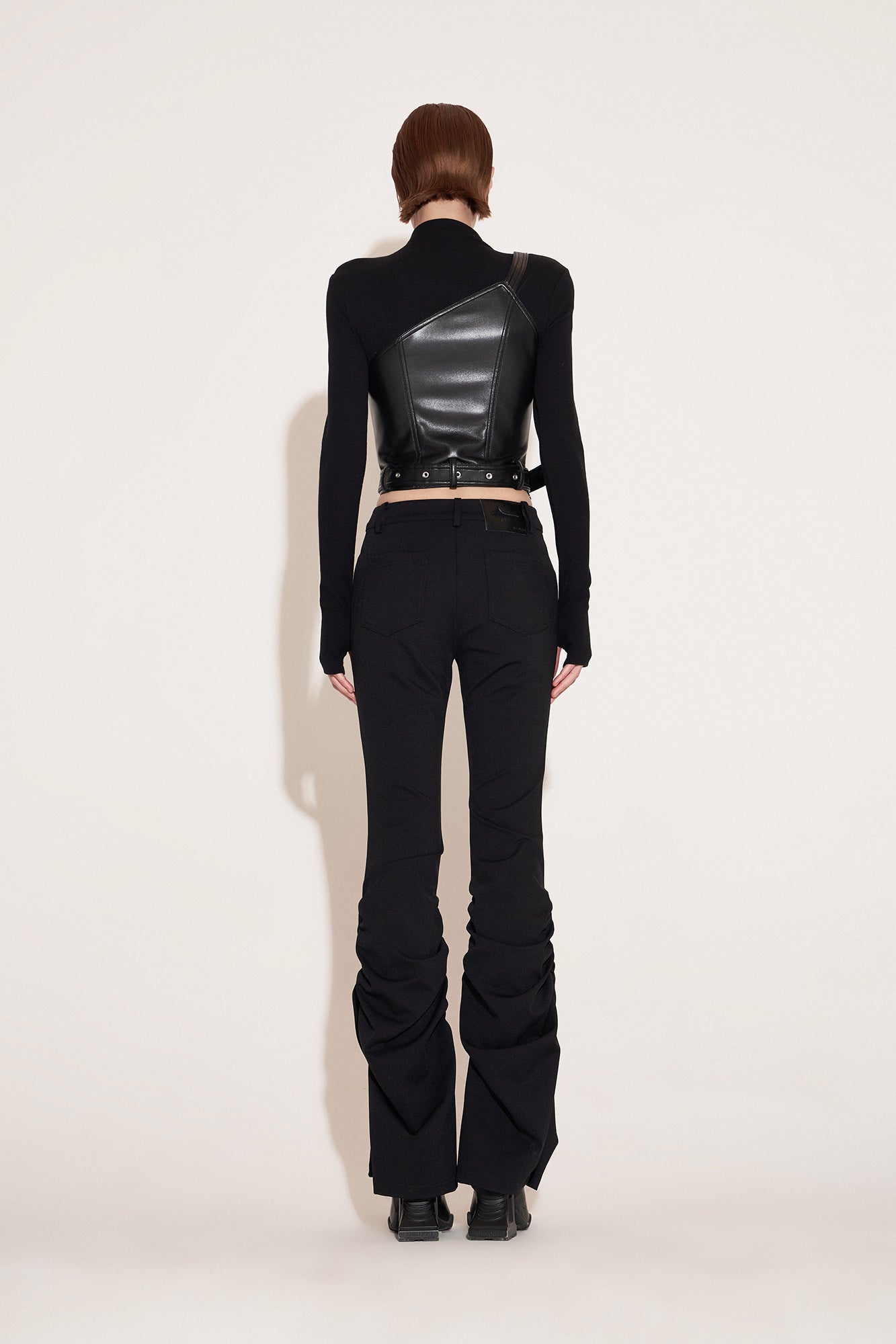 Pleated slim-fit trousers