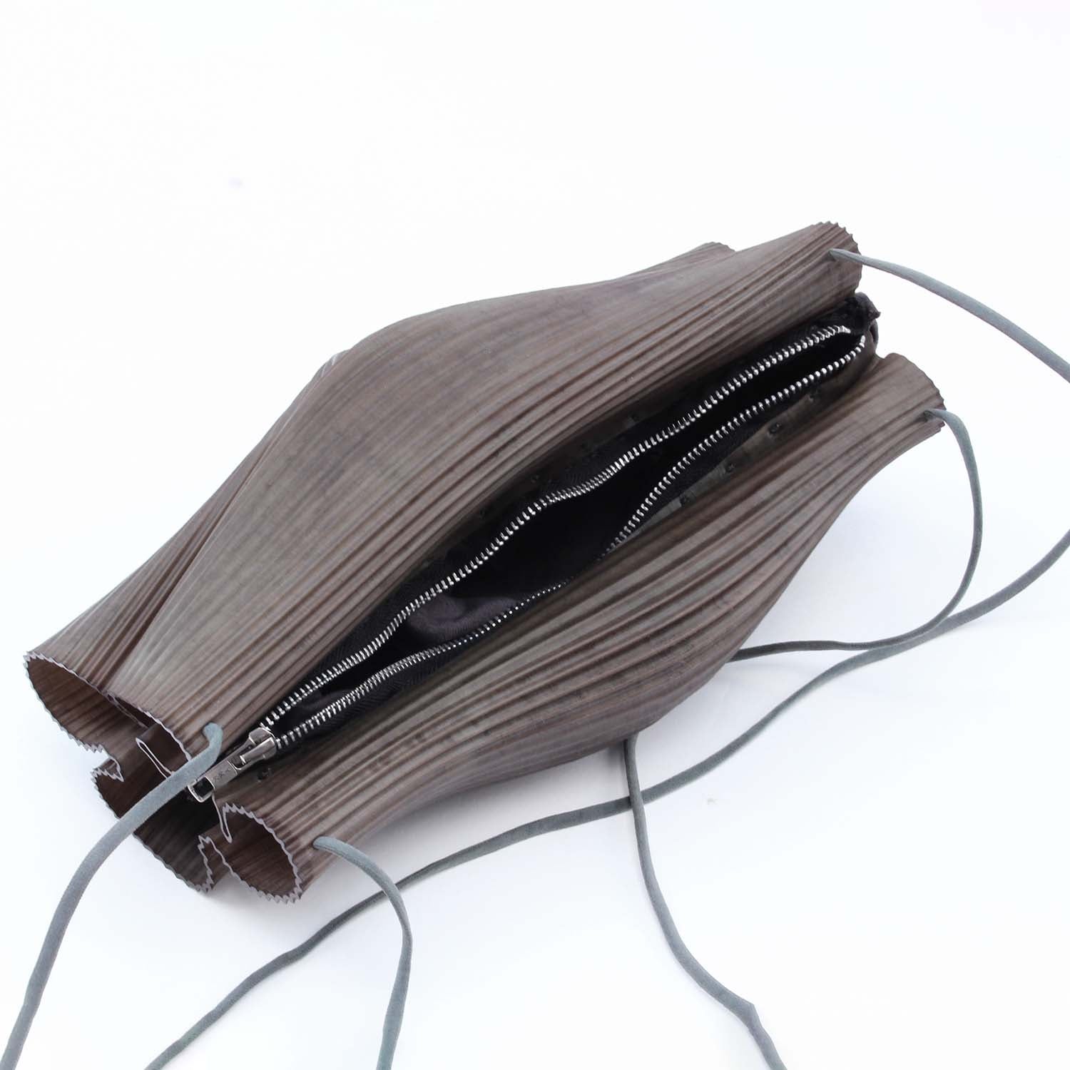 Rubber sling bag, dyed