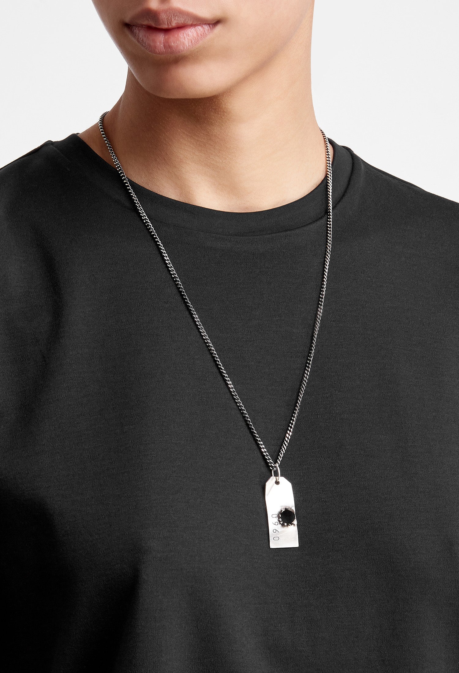 Bullet hole pendant