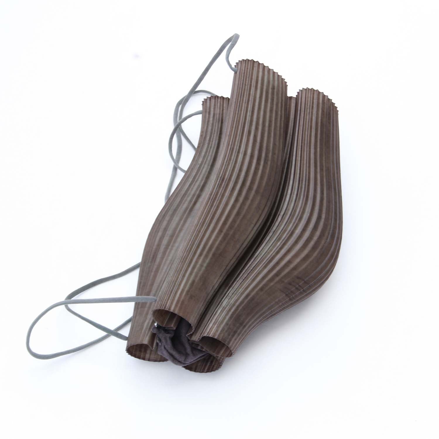 Rubber sling bag, dyed