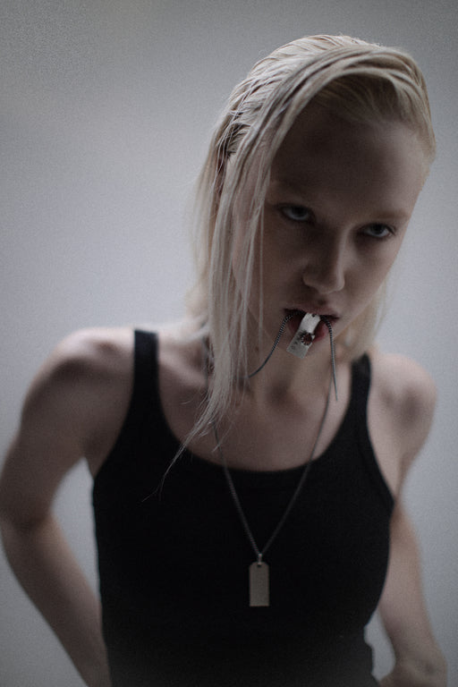Bullet hole pendant