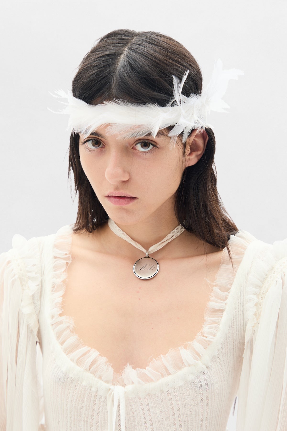 Zena cock feathers on cotton ribbon