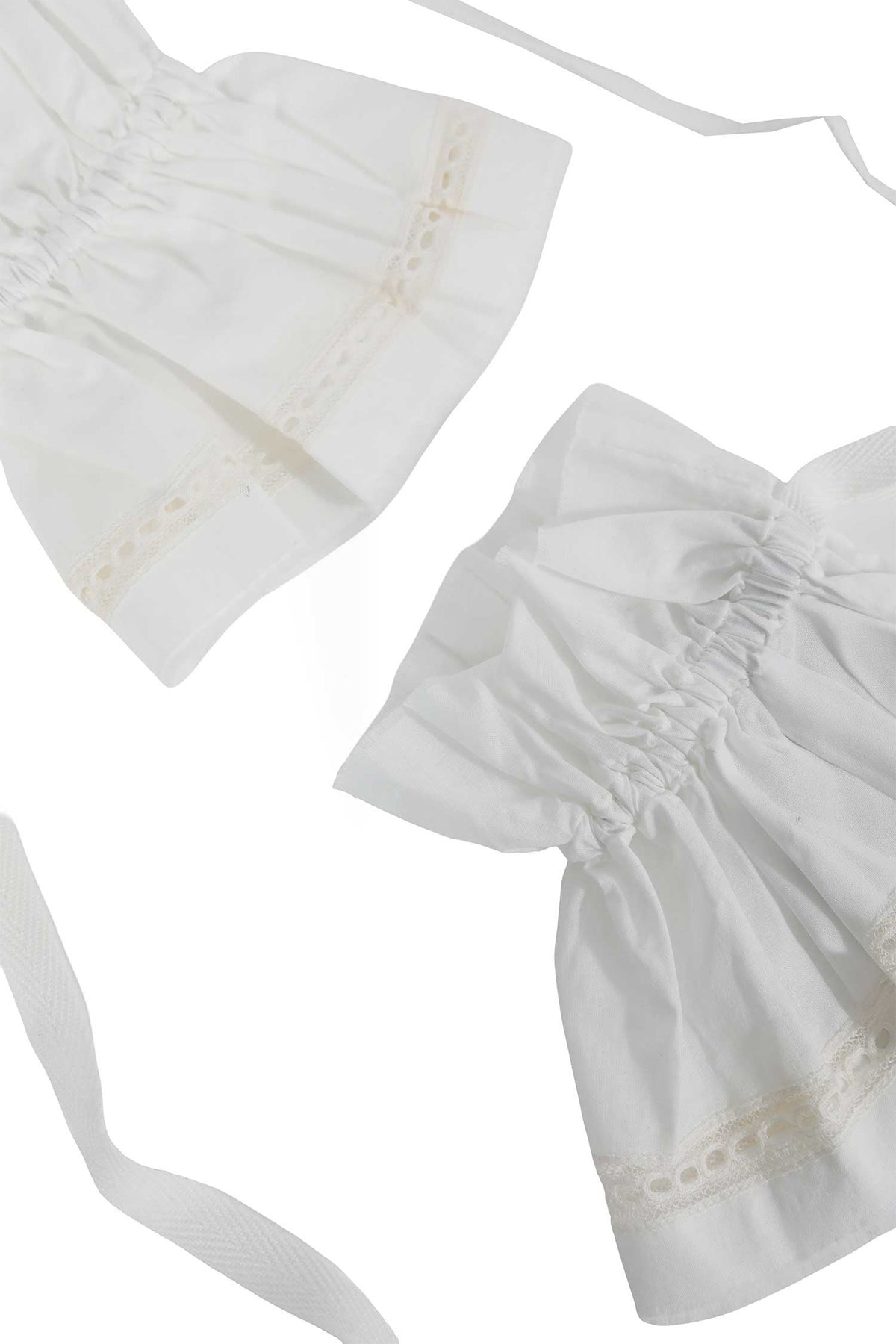 Suna raw edge ruffled cuffs with elongated ribbons