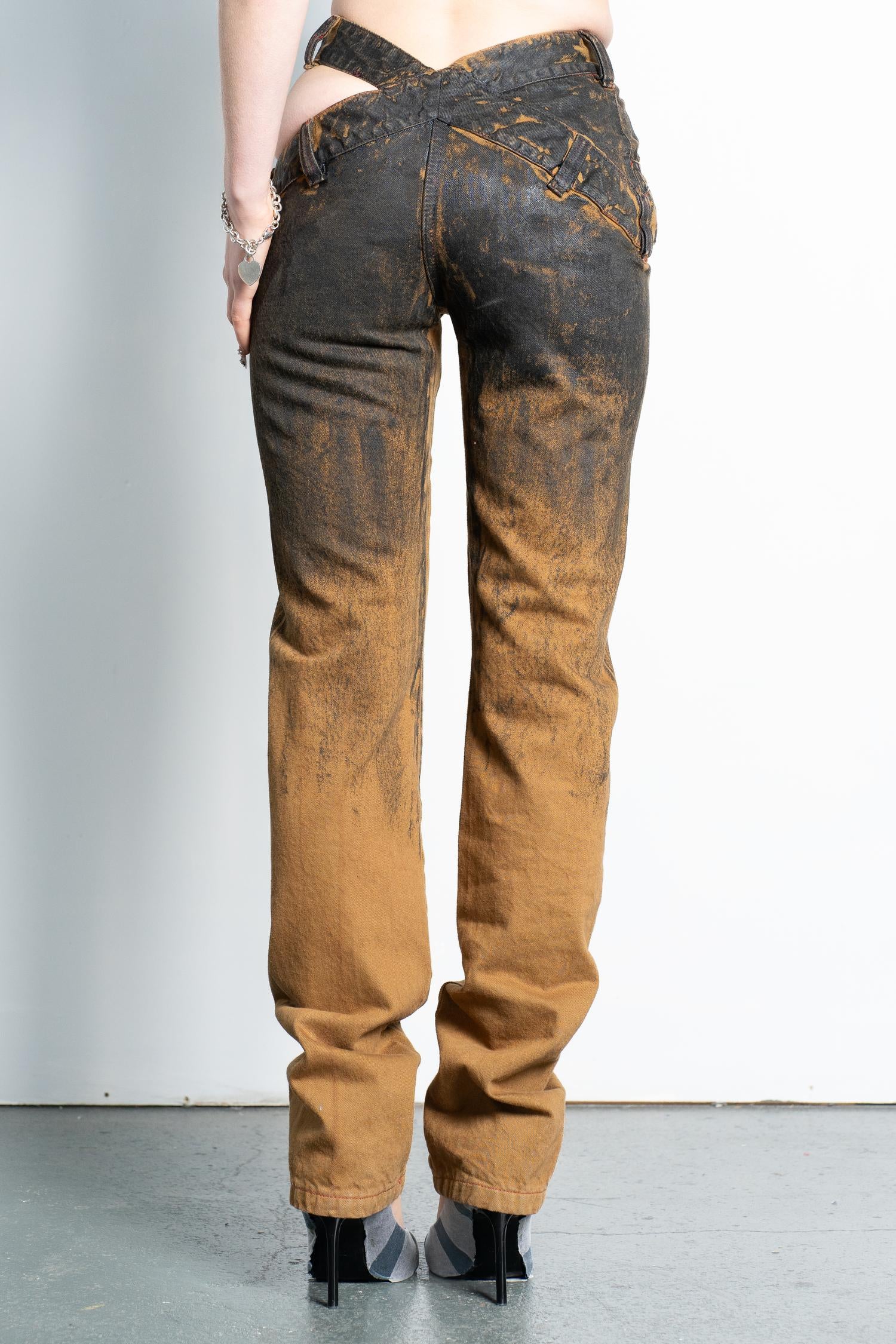 Bias cut tarred cut out skinny jeans