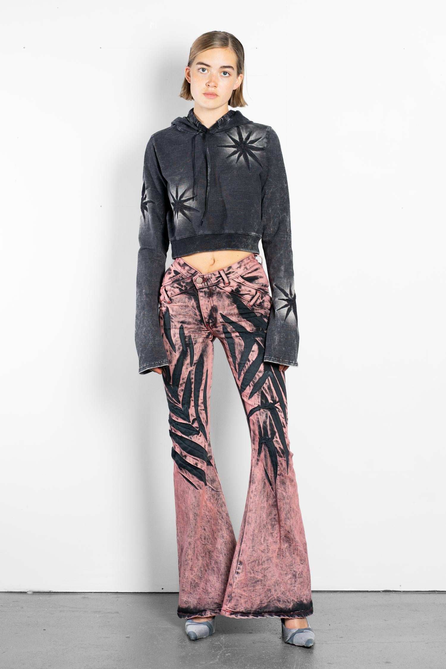 V-shape flare jeans with animal whisker pattern