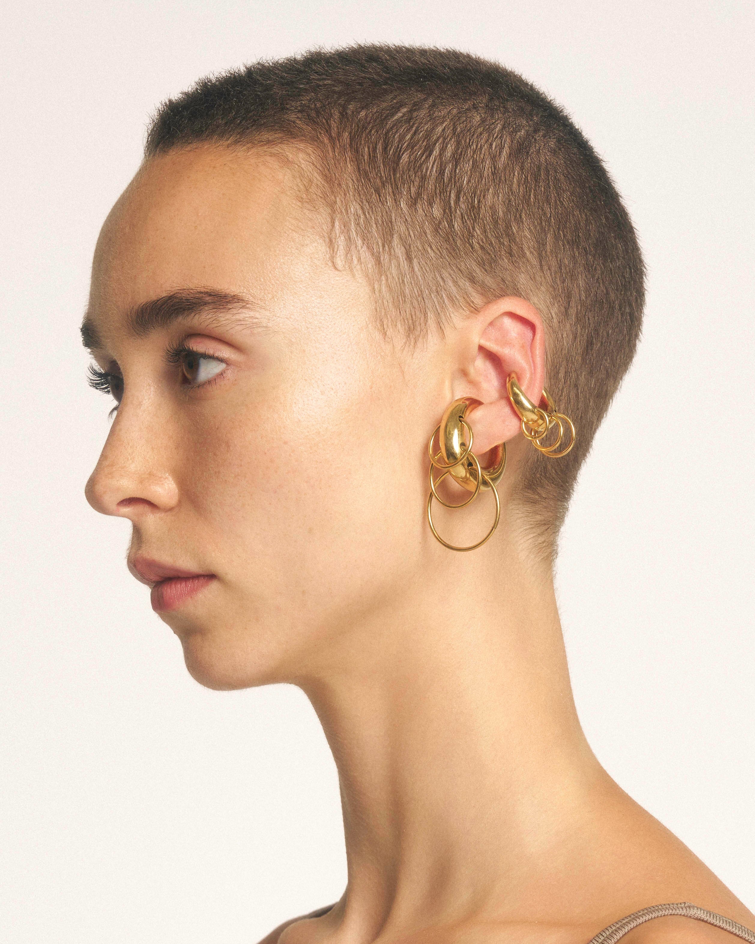 Pierced circle cuffs