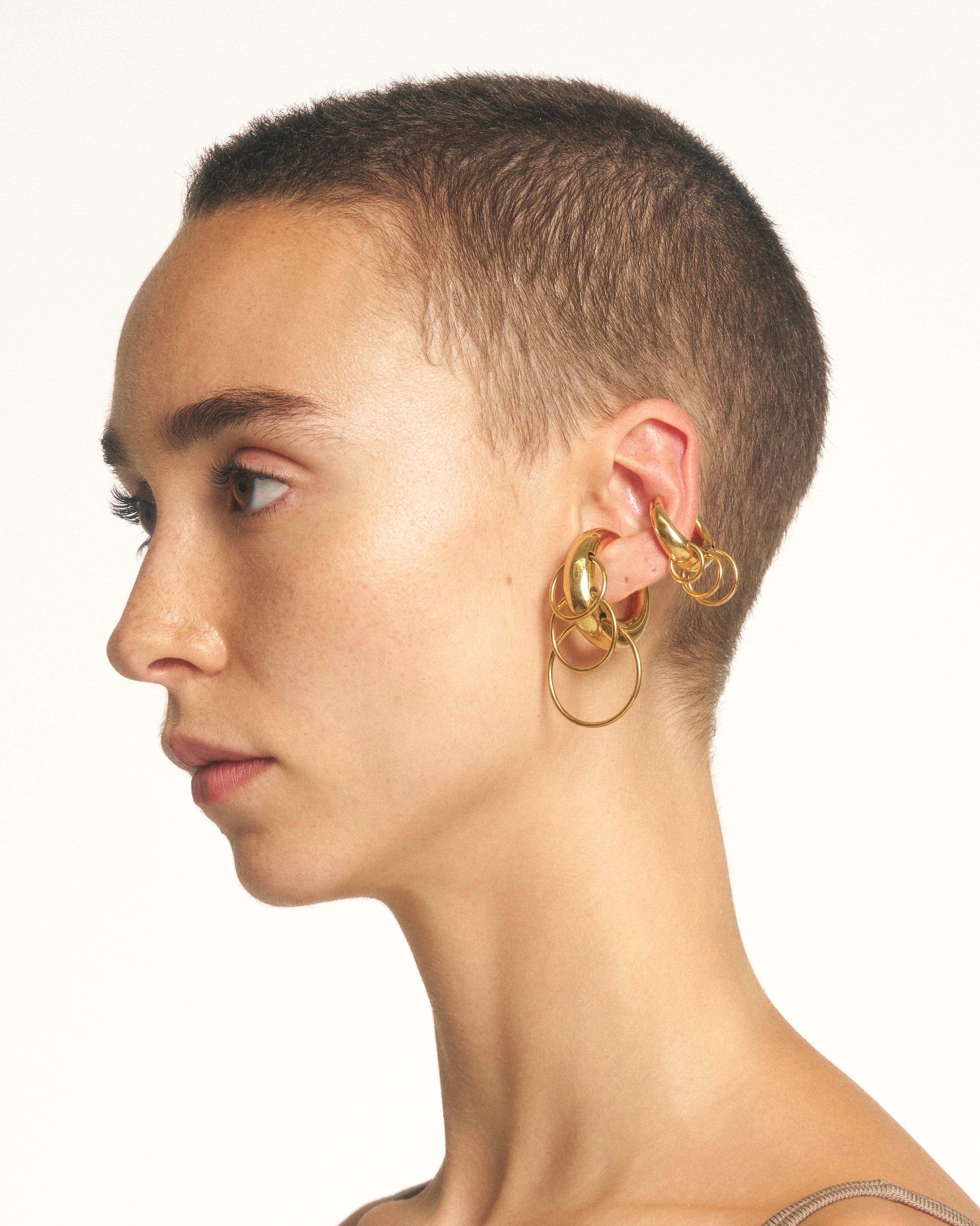Pierced circle cuffs