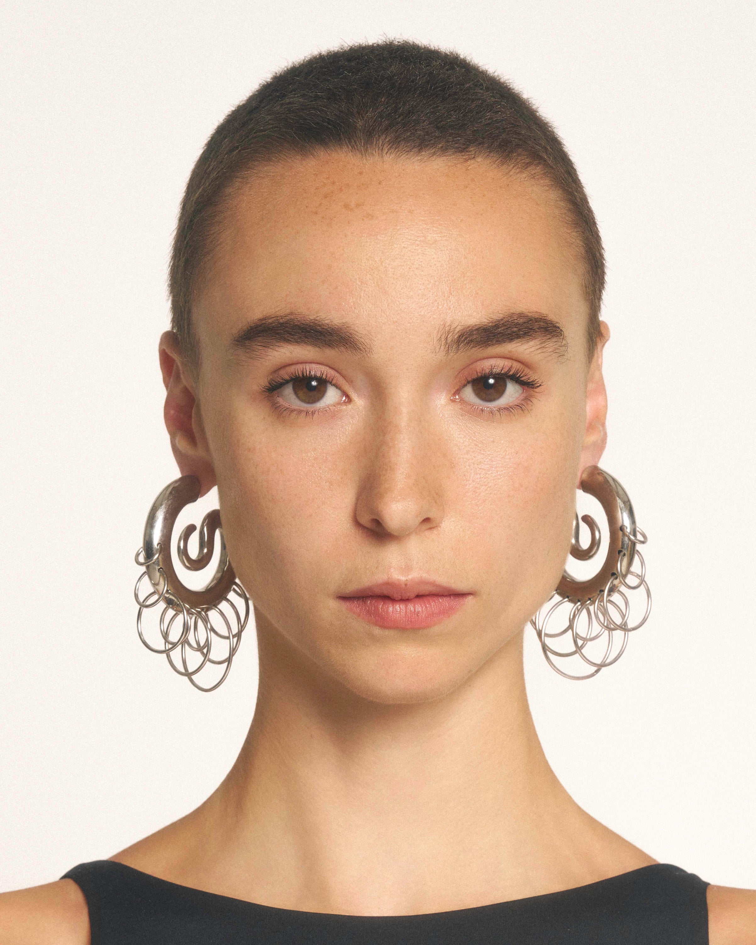 Pierced serpent hoops medium