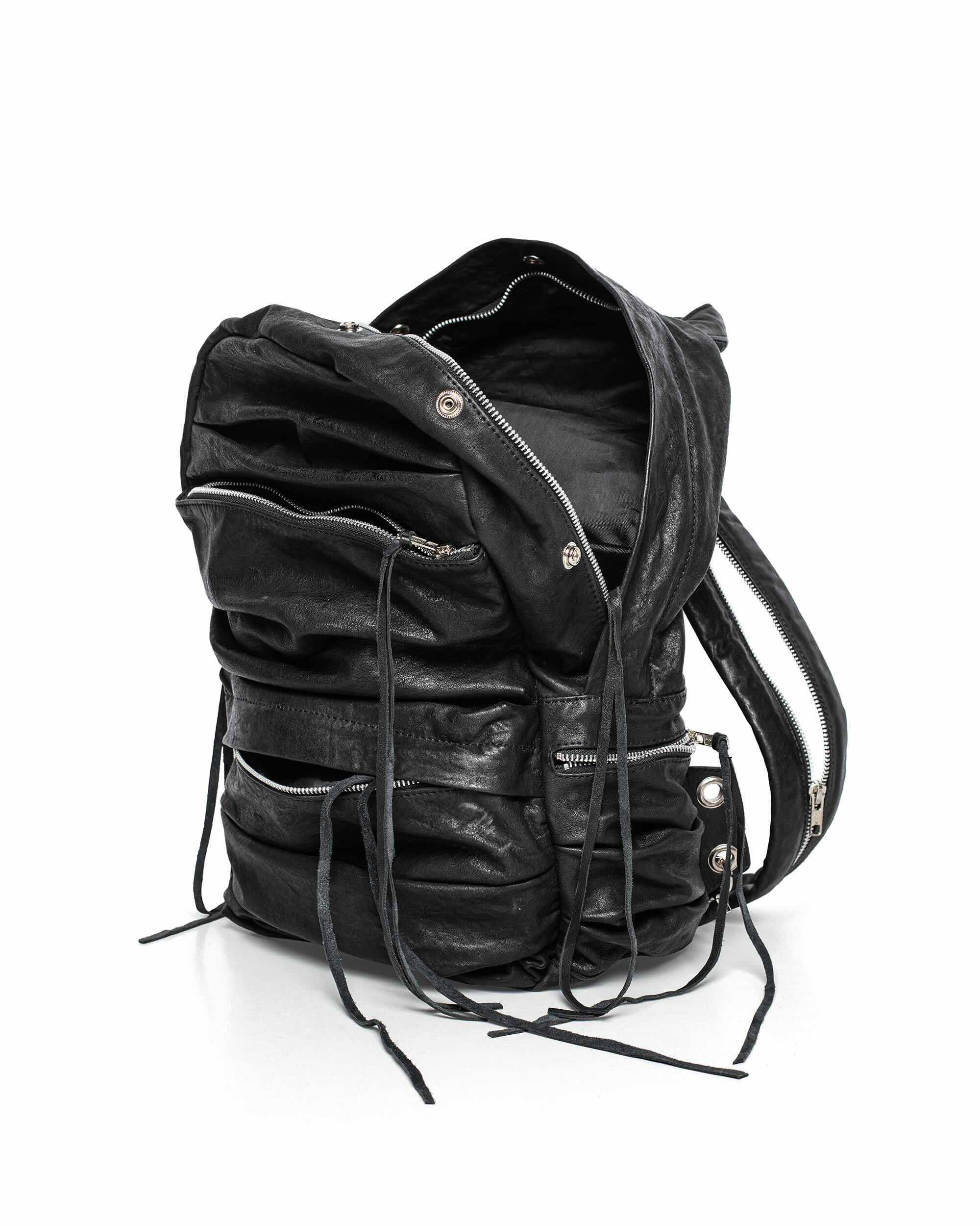 Split strap leather backpack