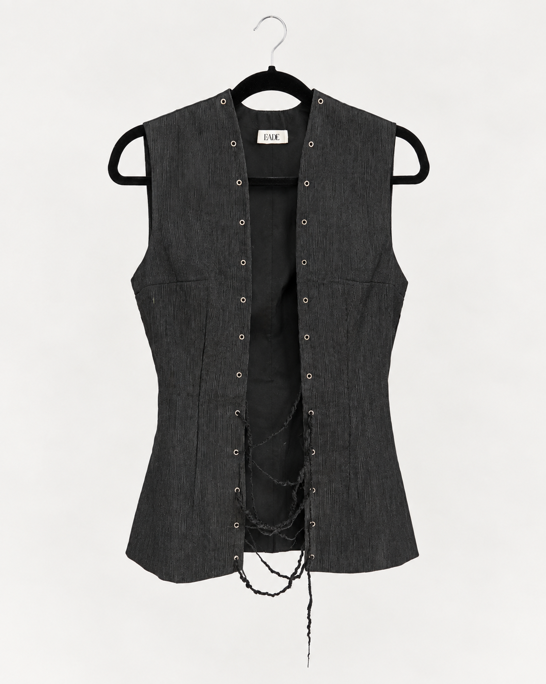 Black eyelets vest