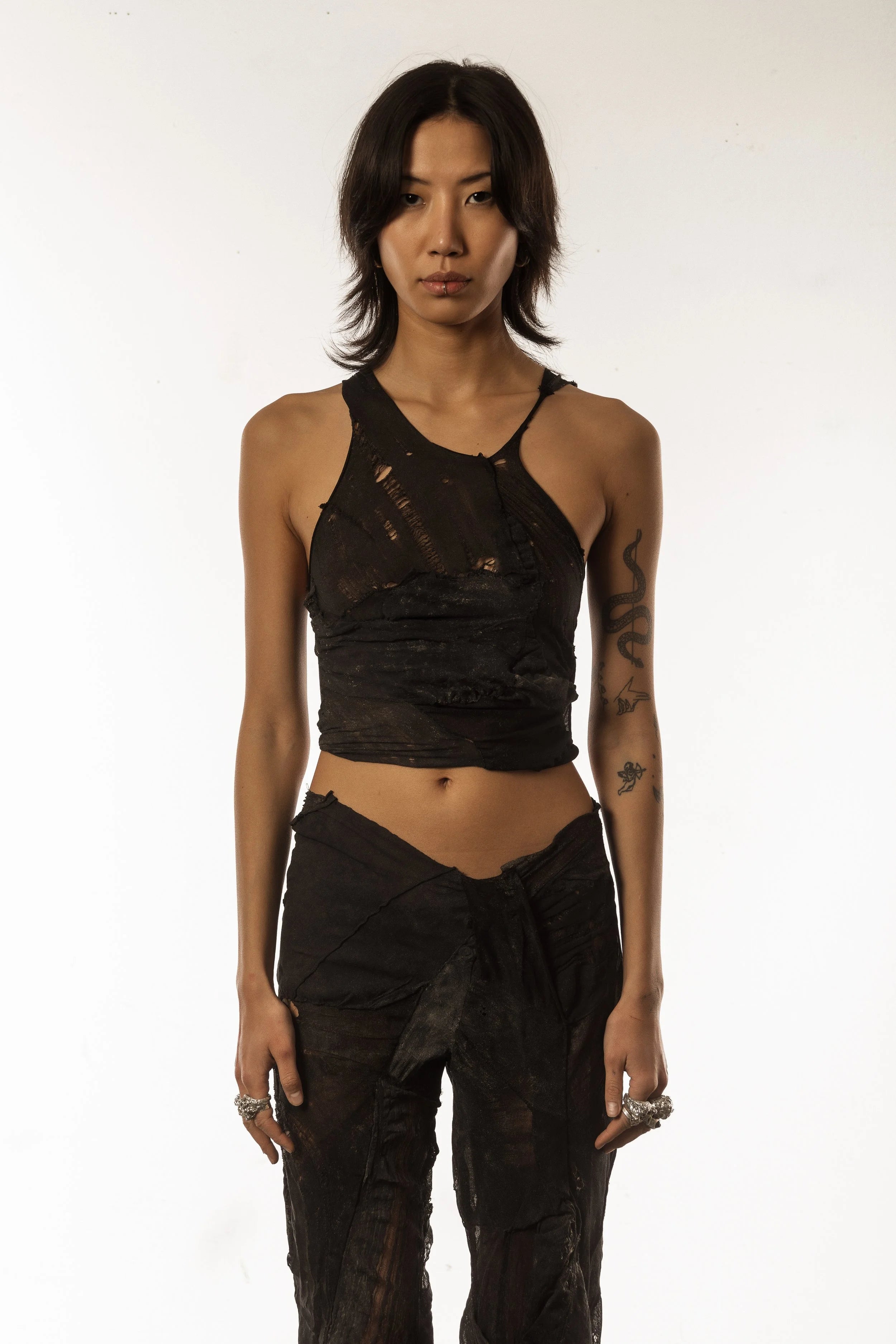 Distorted tights top