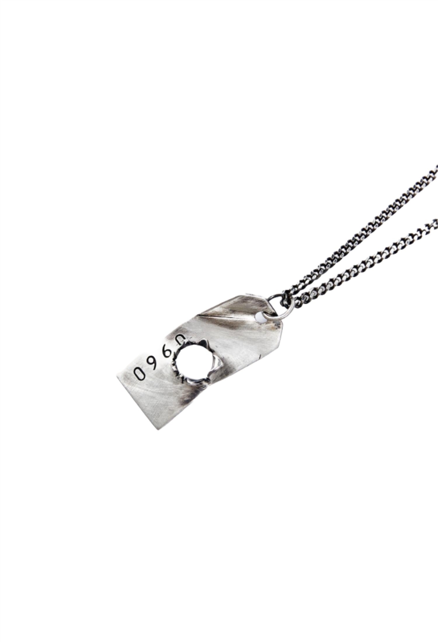 Bullet hole pendant