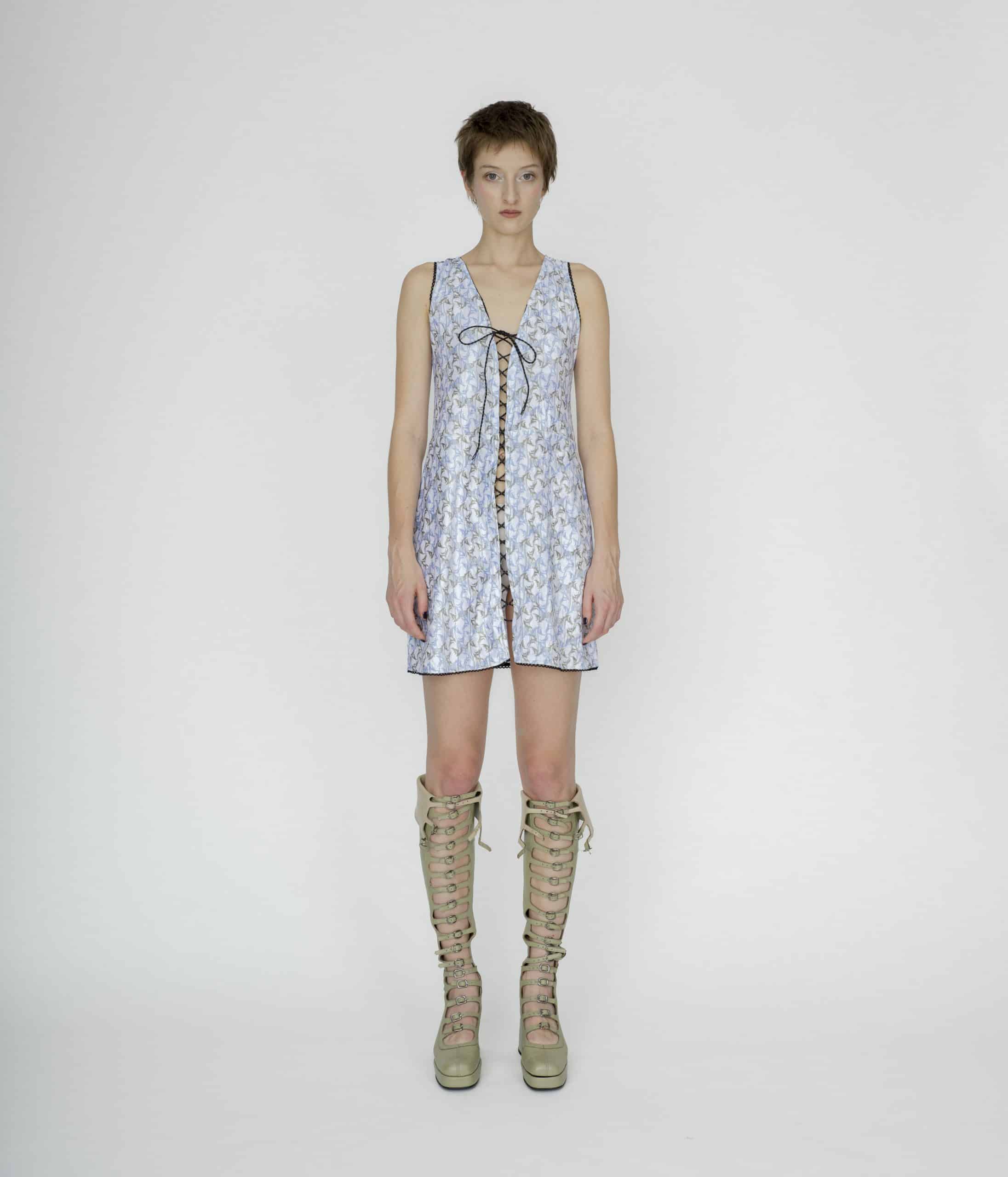 Symbolic lace up mini dress