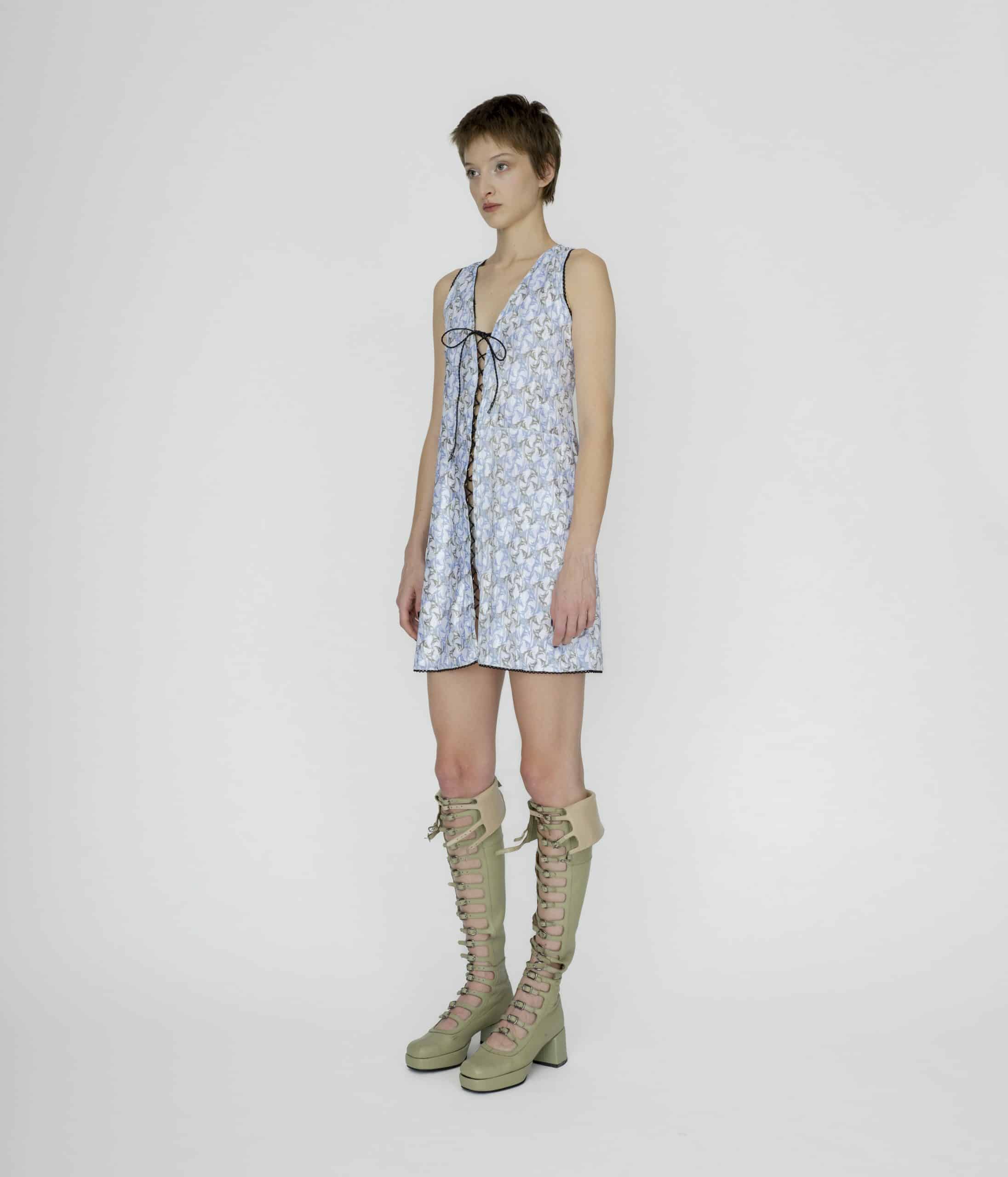 Symbolic lace up mini dress