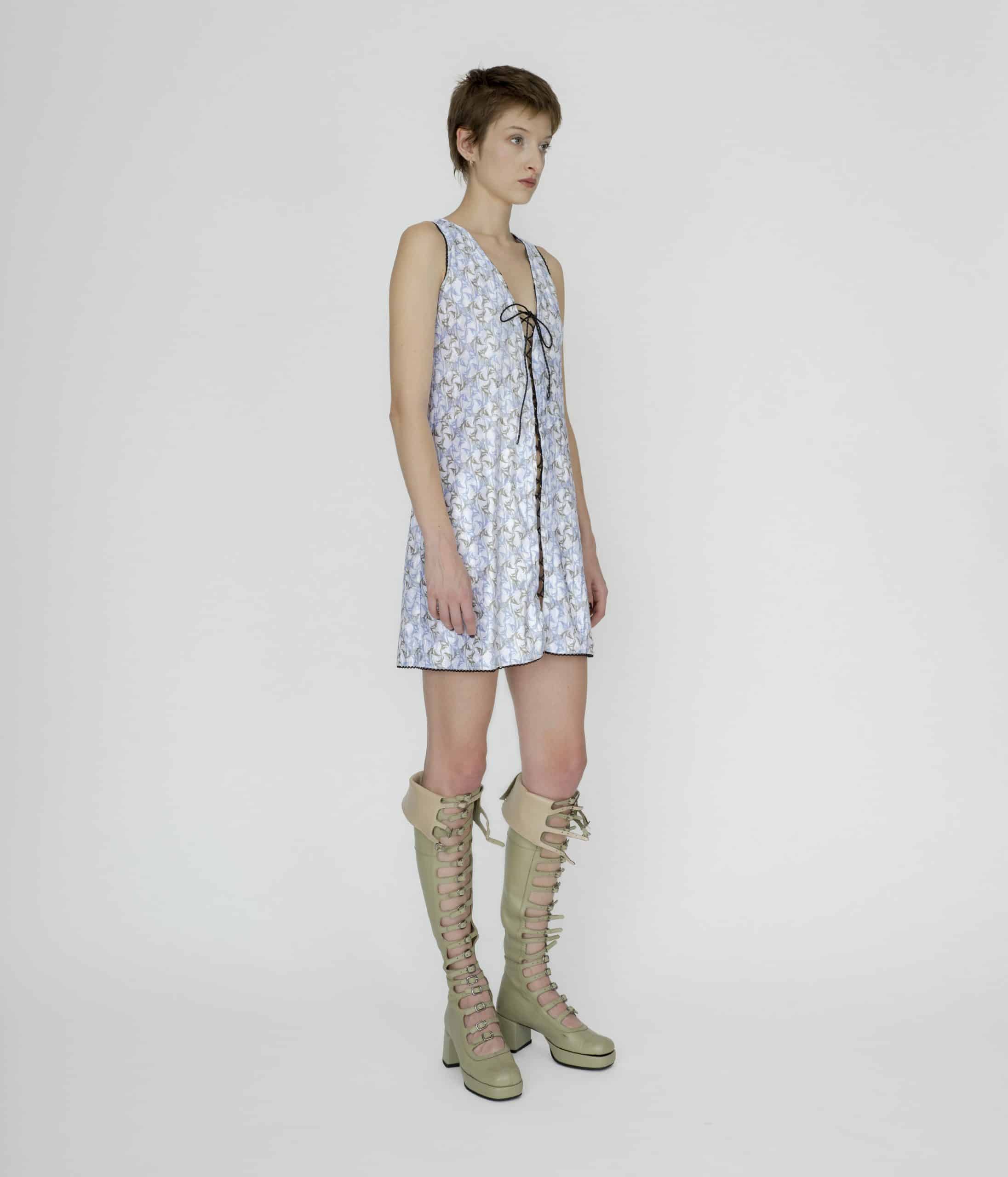 Symbolic lace up mini dress