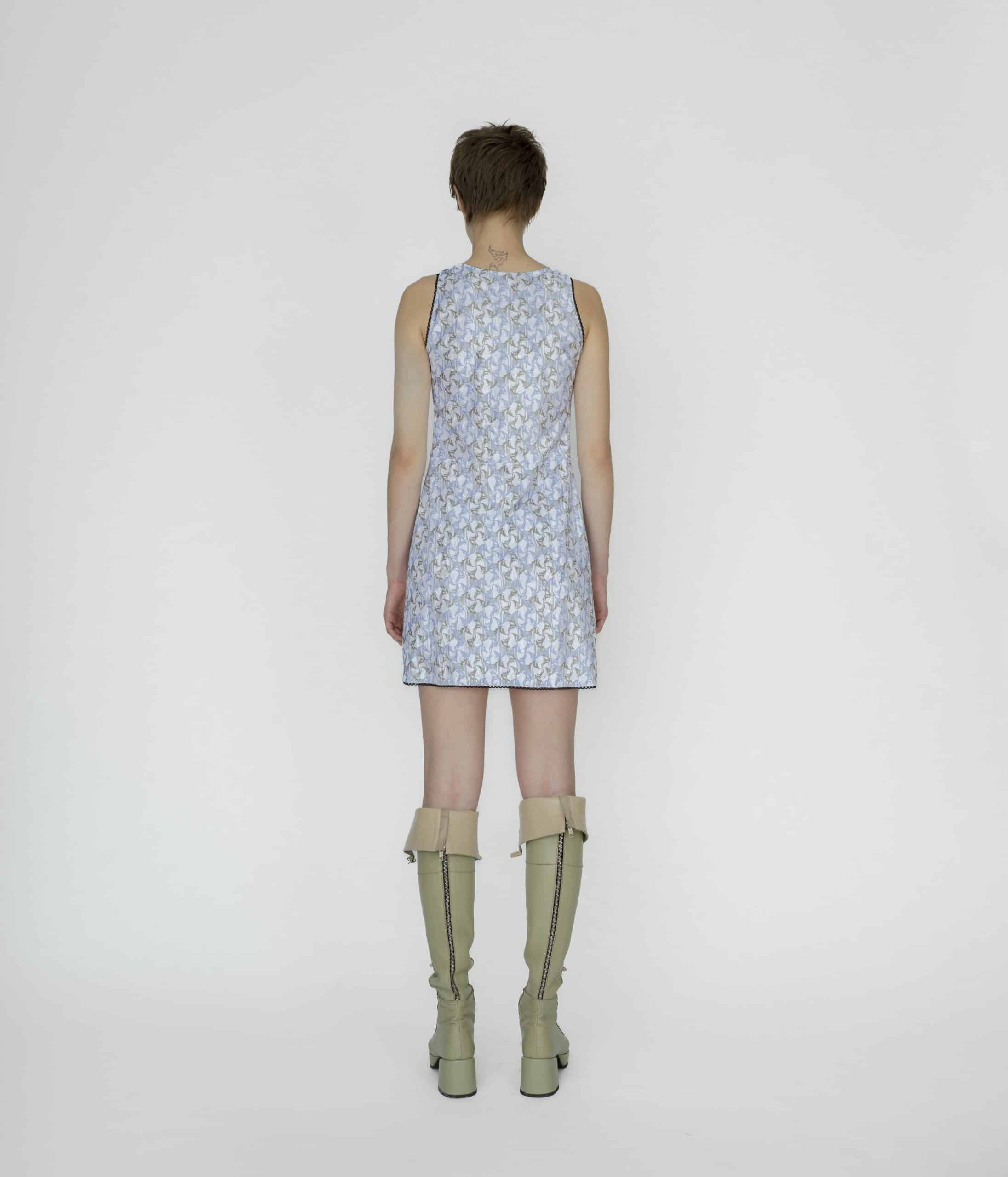 Symbolic lace up mini dress