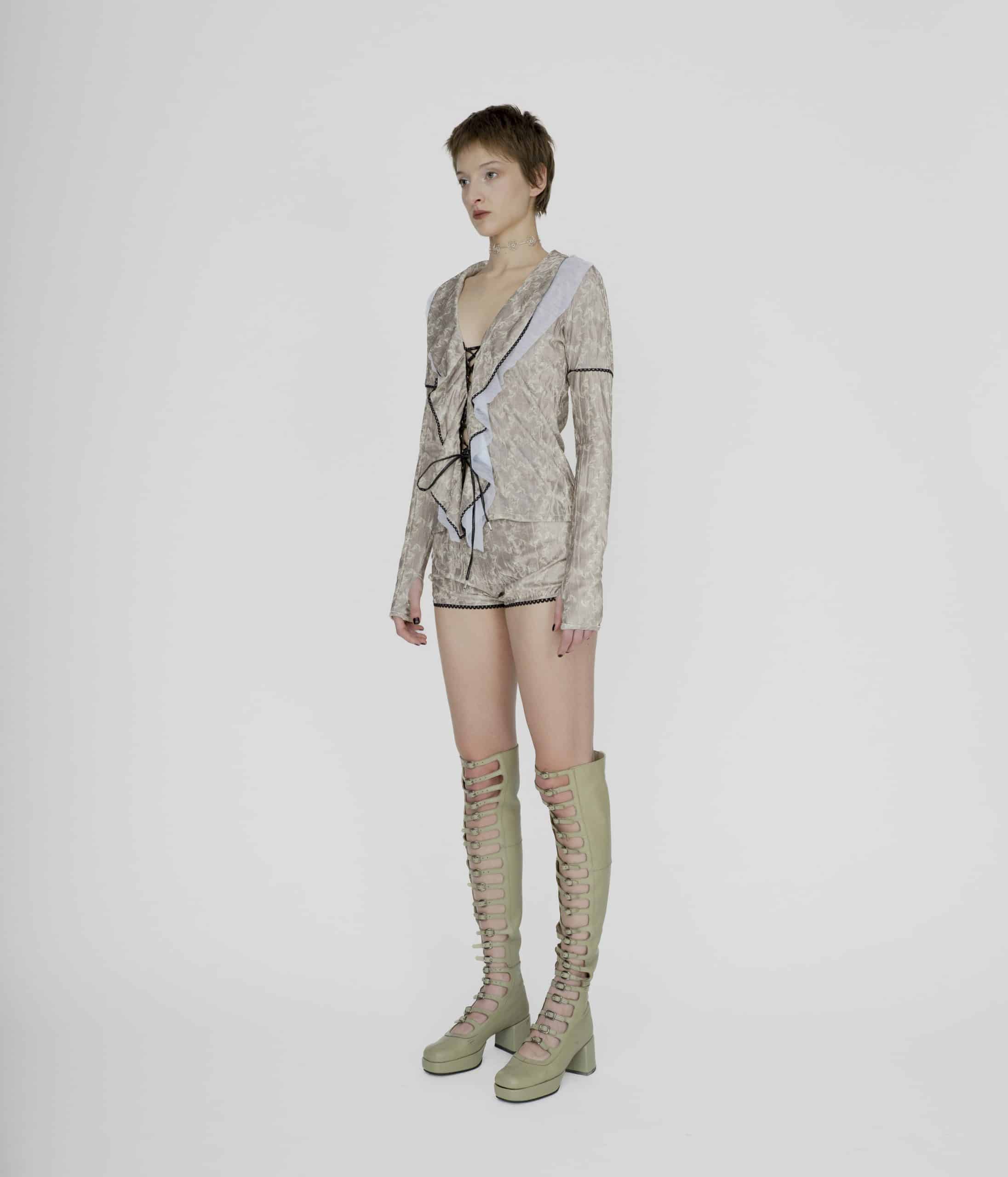 Lace up symbolic beige blouse