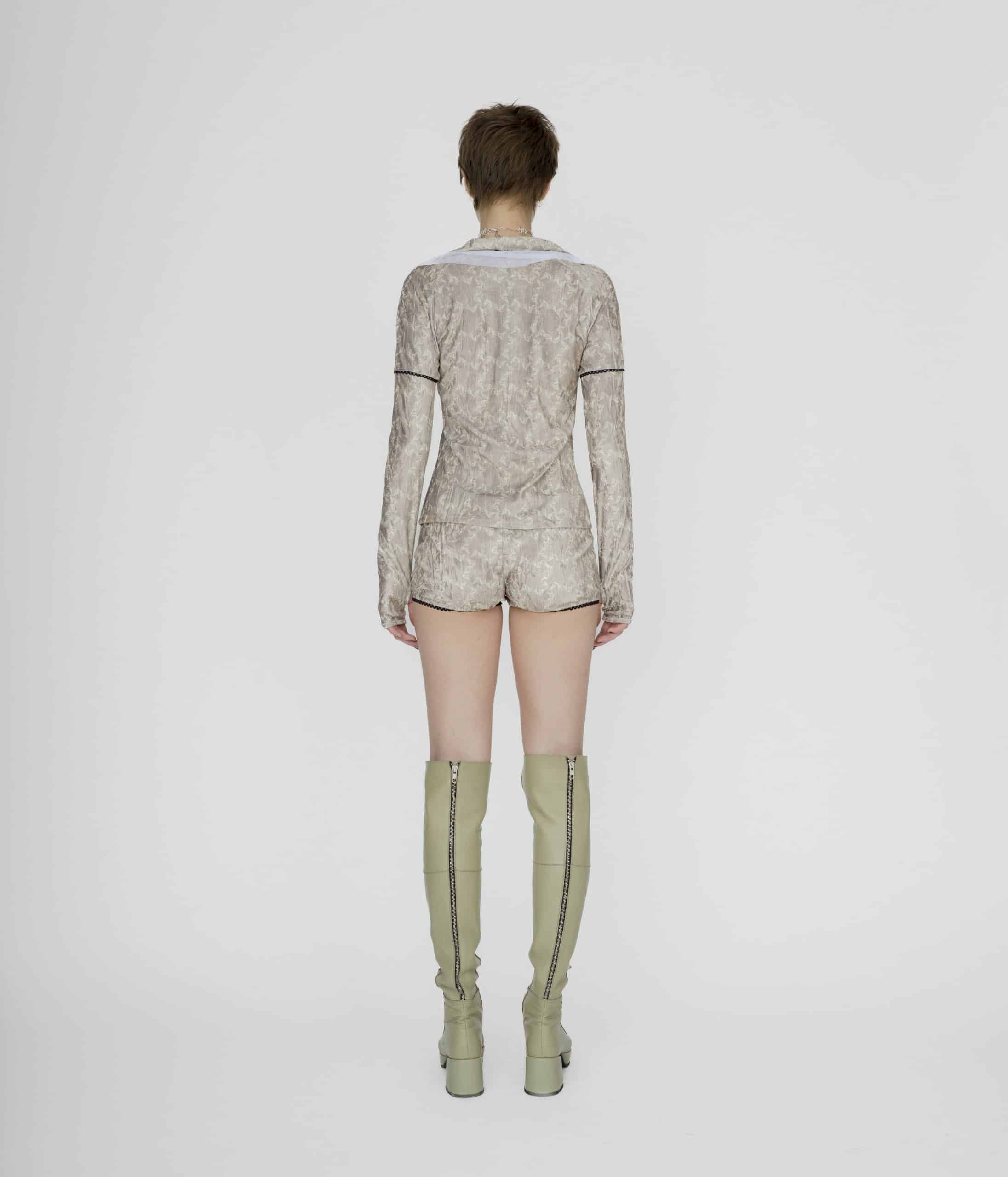 Lace up symbolic beige blouse
