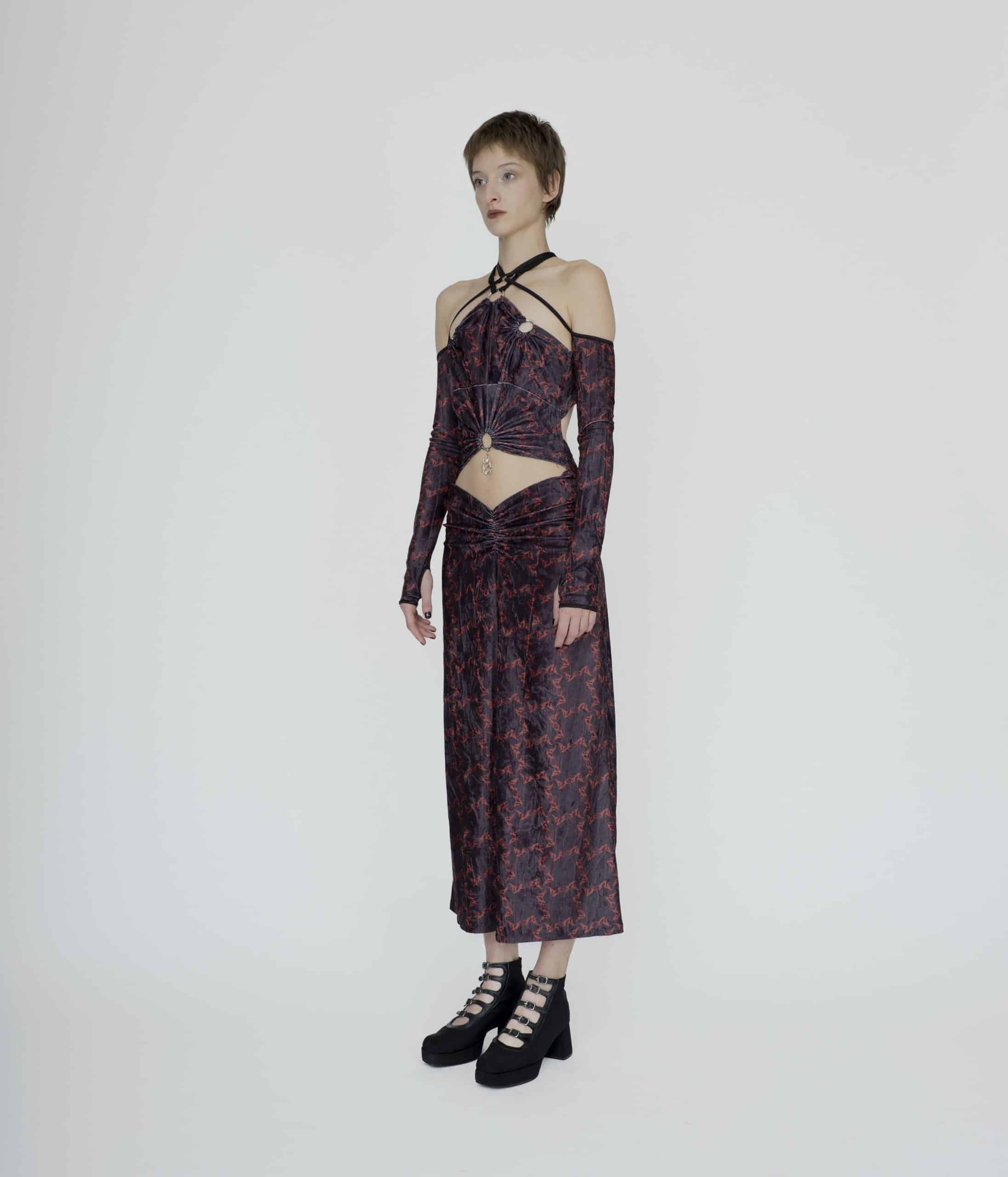 Symbolic deconstructed cut out  dress