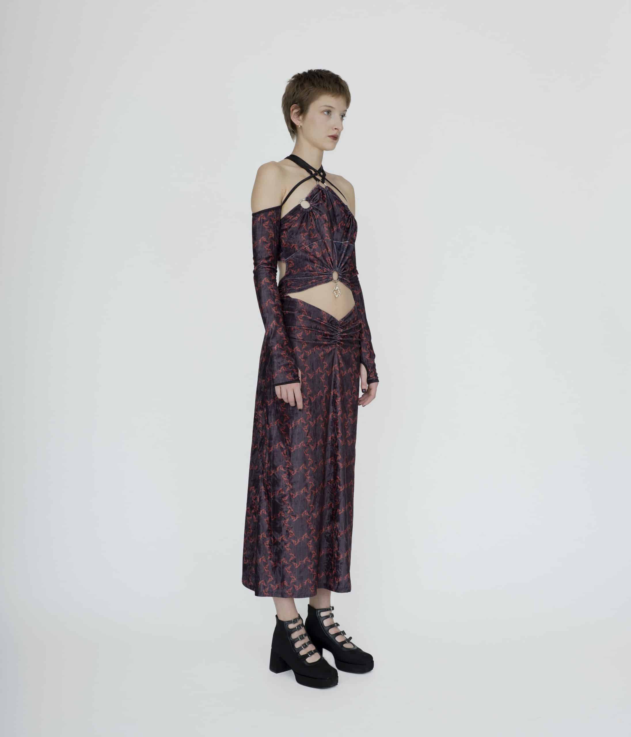 Symbolic deconstructed cut out  dress