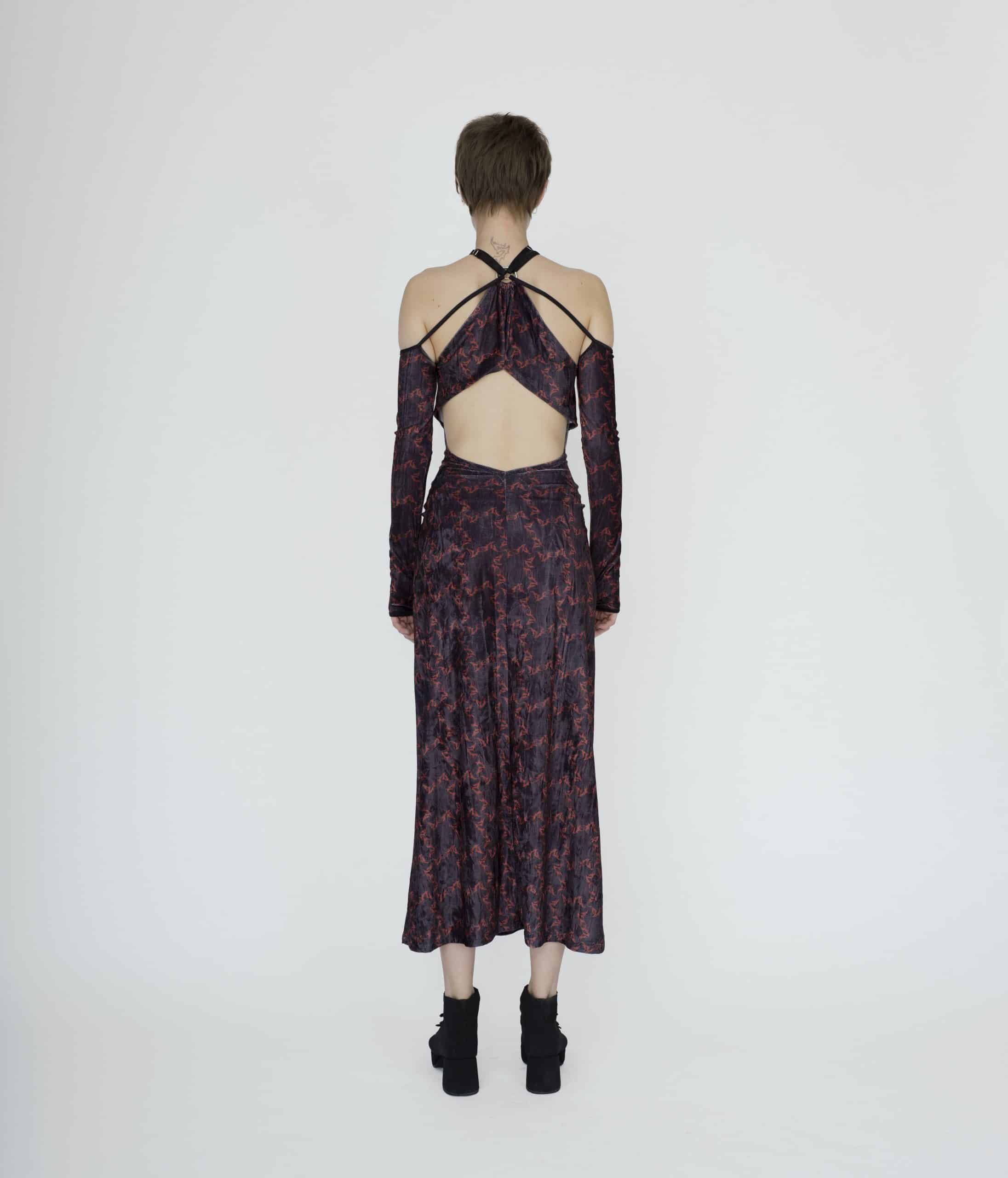 Symbolic deconstructed cut out  dress