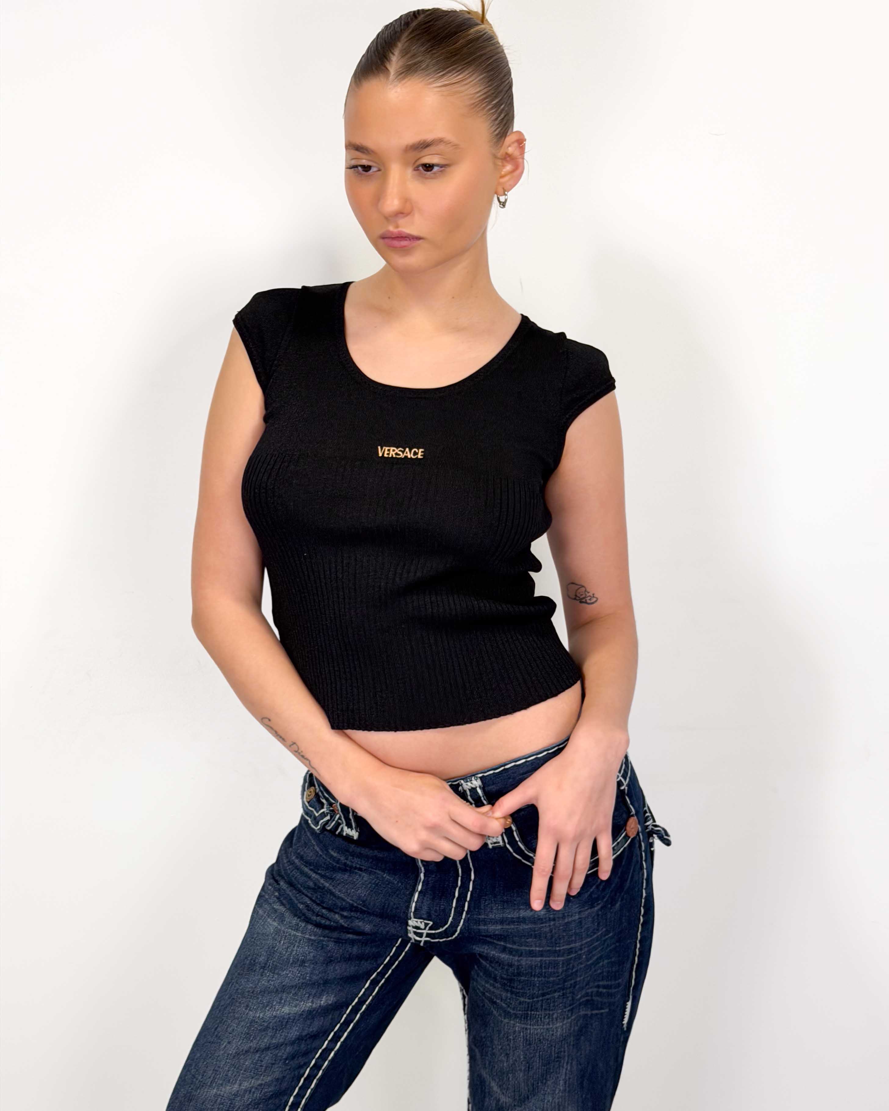 The gracie top by versace