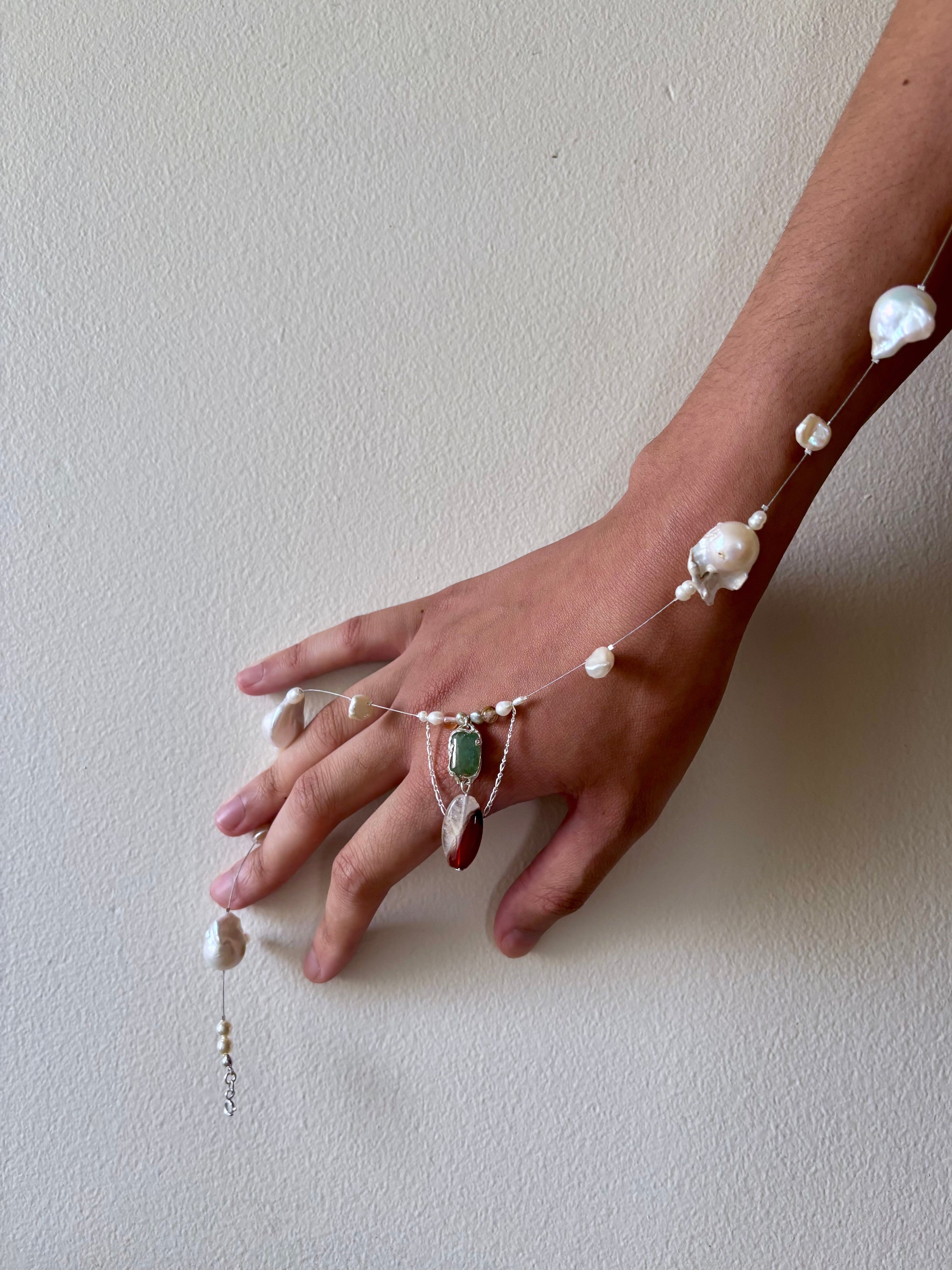 Tidal relic necklace - green emerald