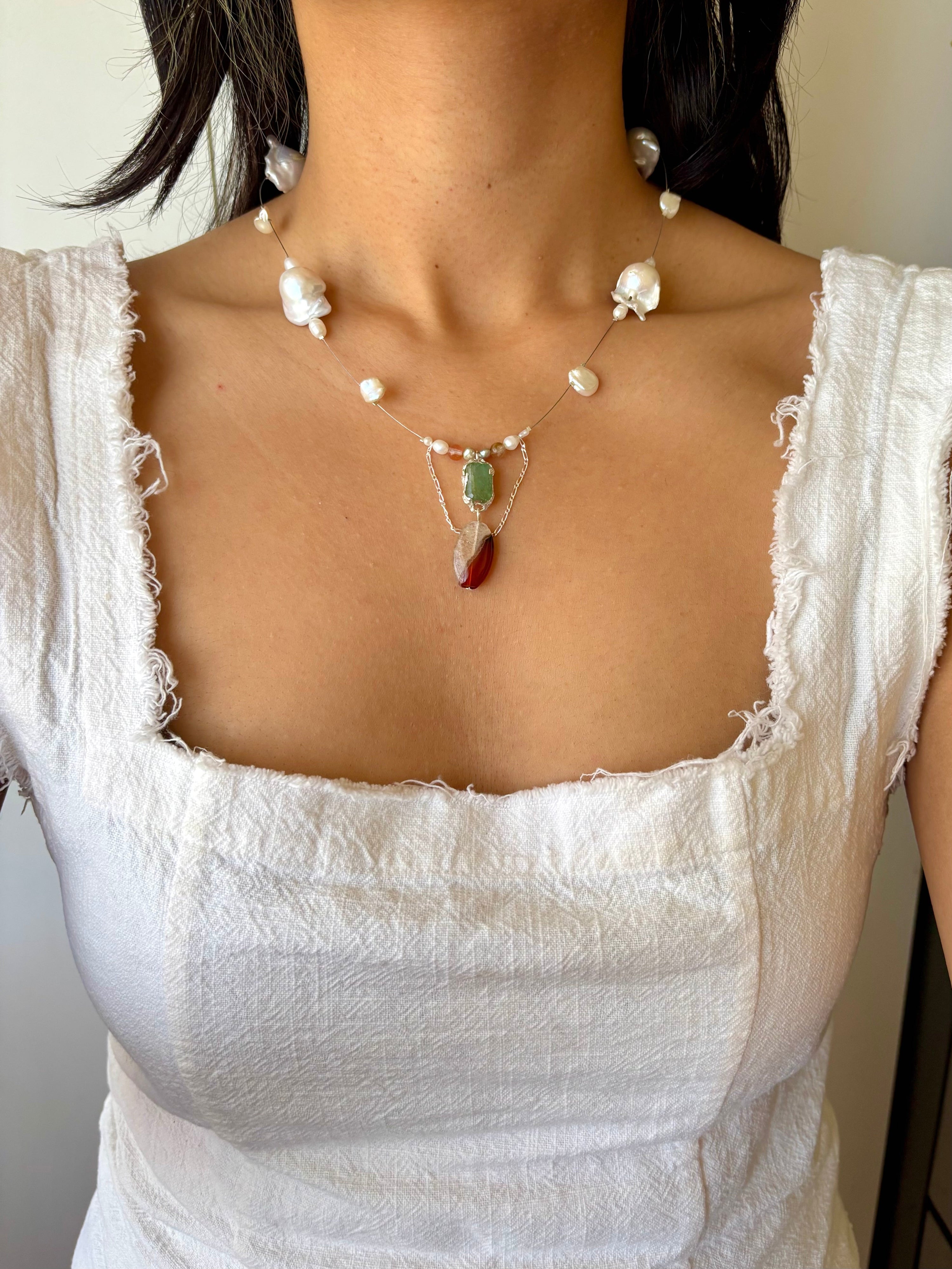 Tidal relic necklace - green emerald