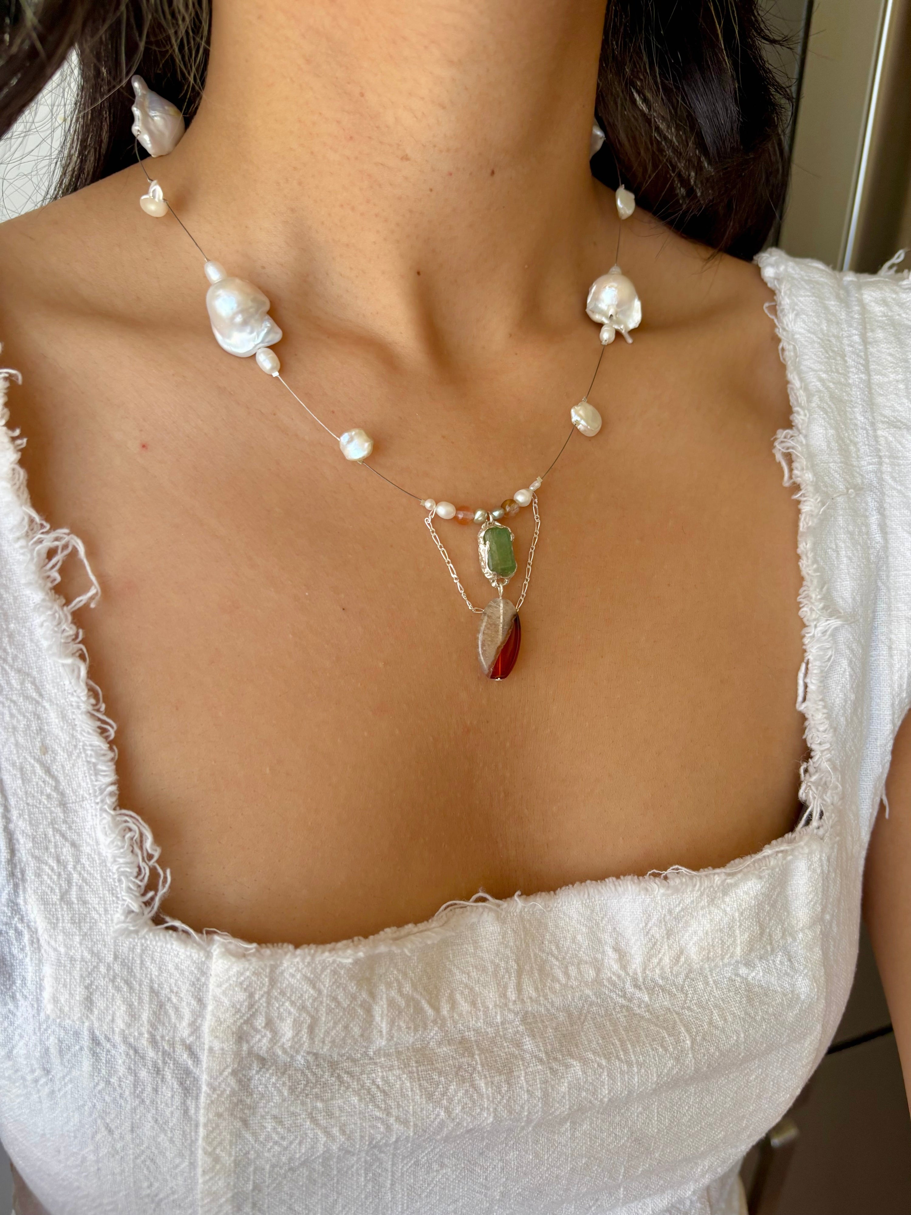 Tidal relic necklace - green emerald