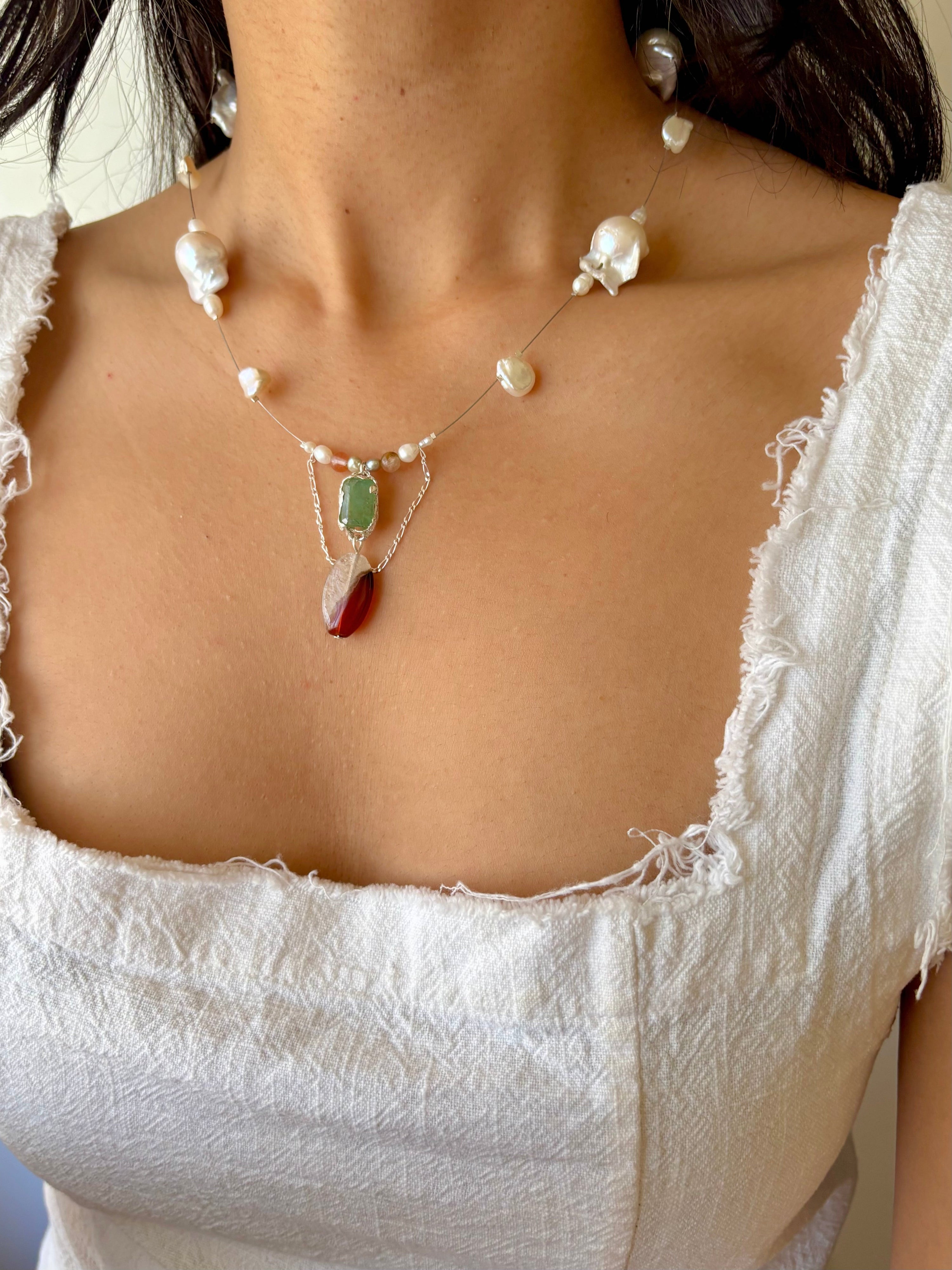 Tidal relic necklace - green emerald