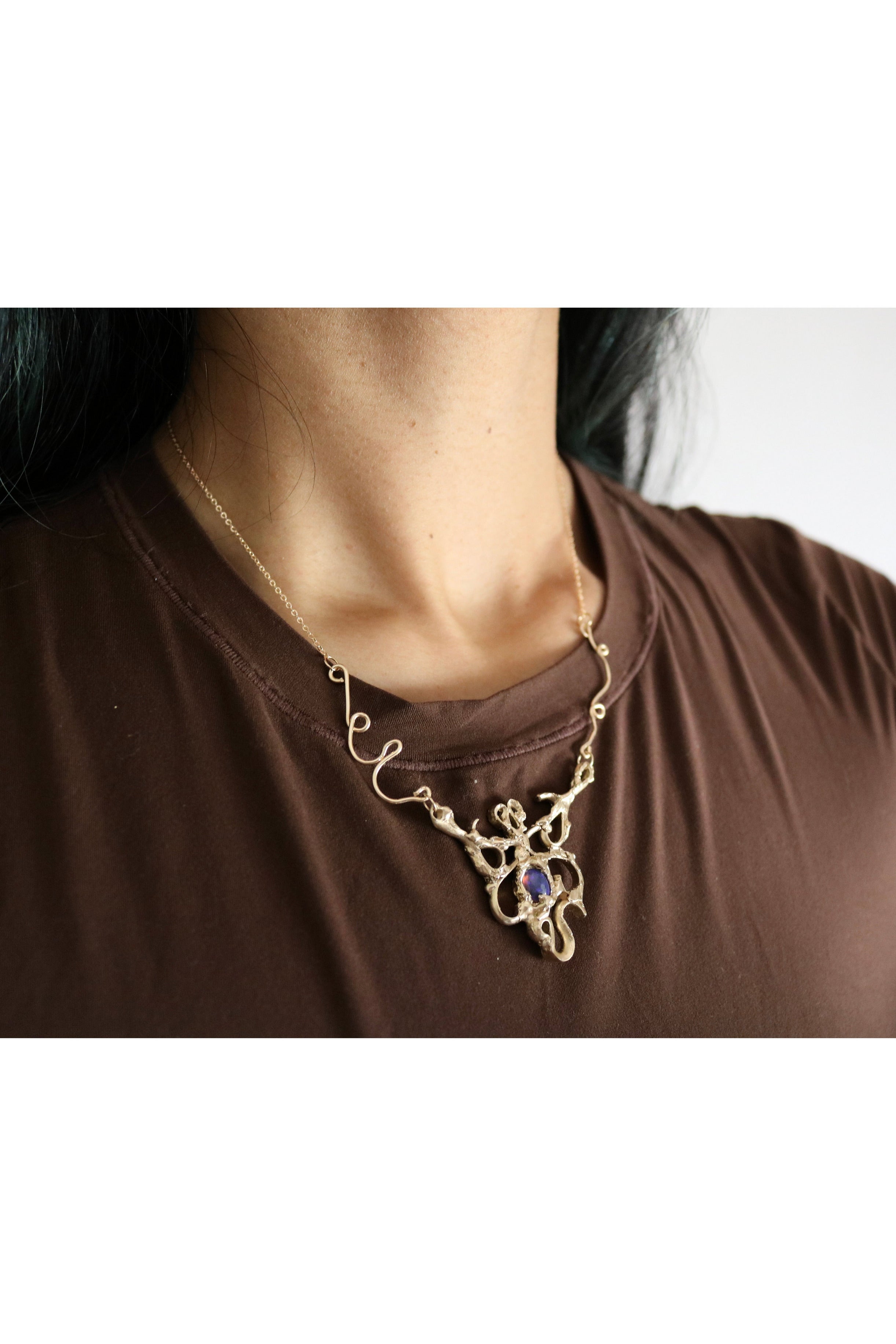 Metamorphosis necklace - gold