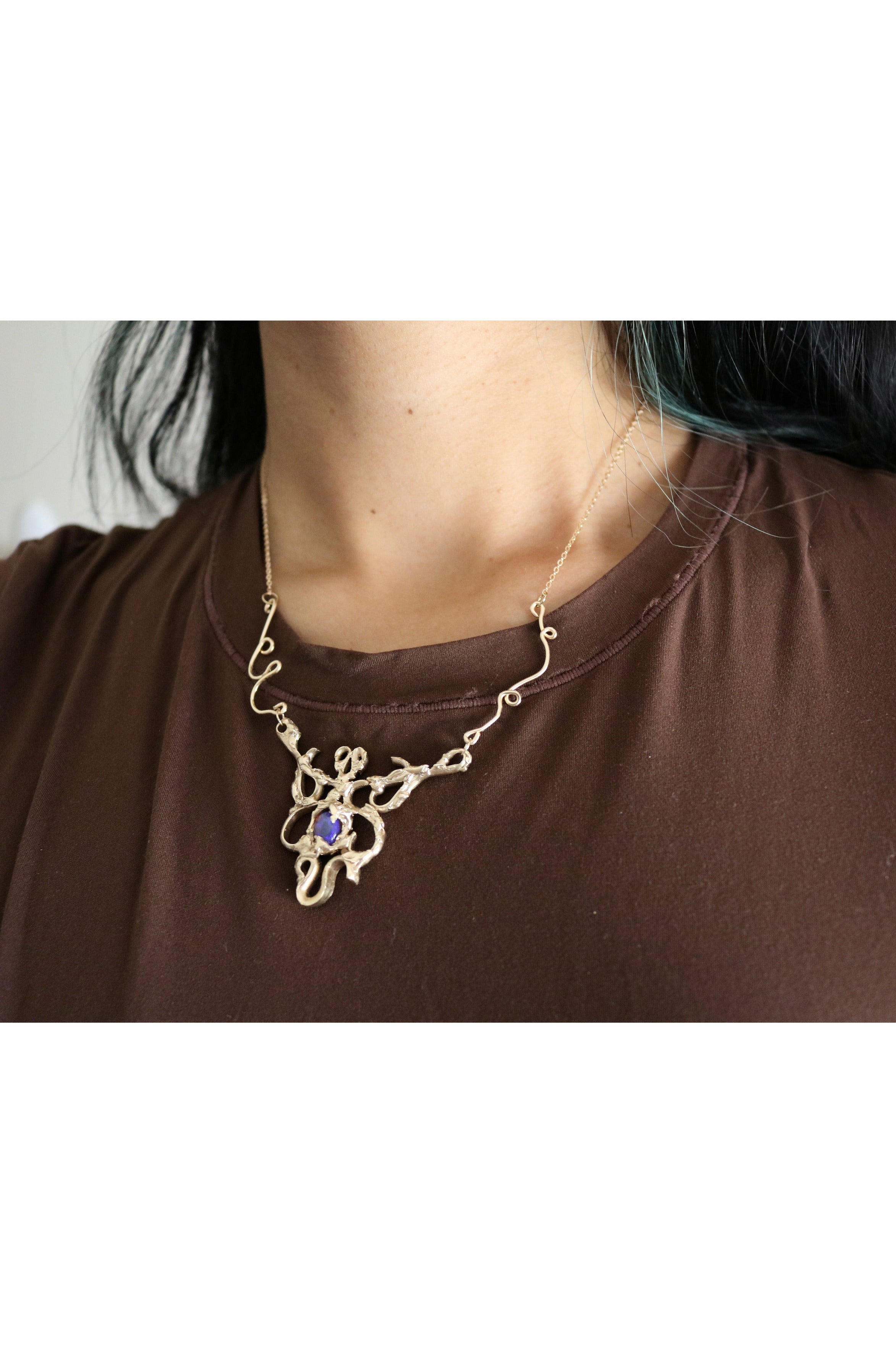 Metamorphosis necklace - gold