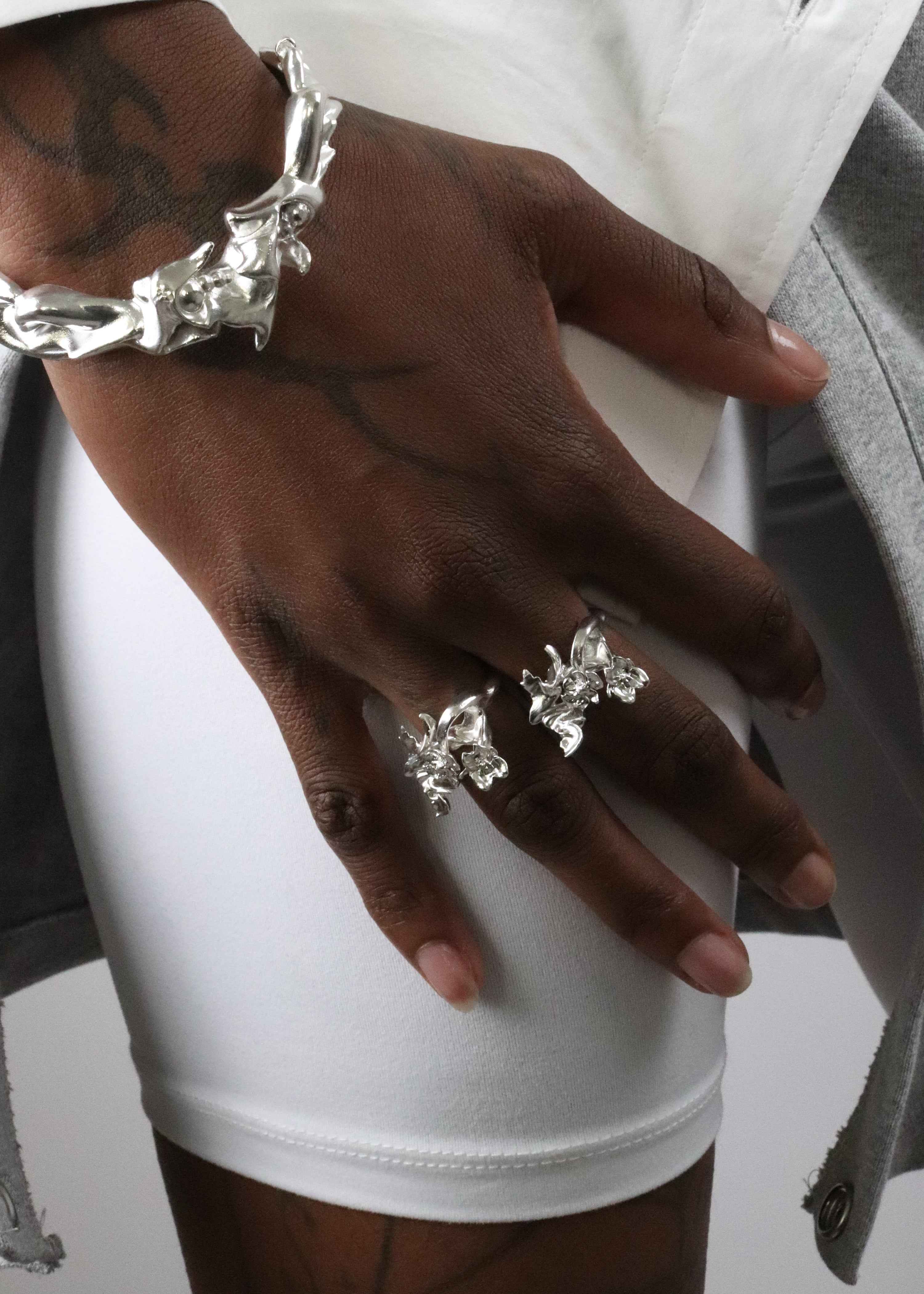 Double headed floral ring