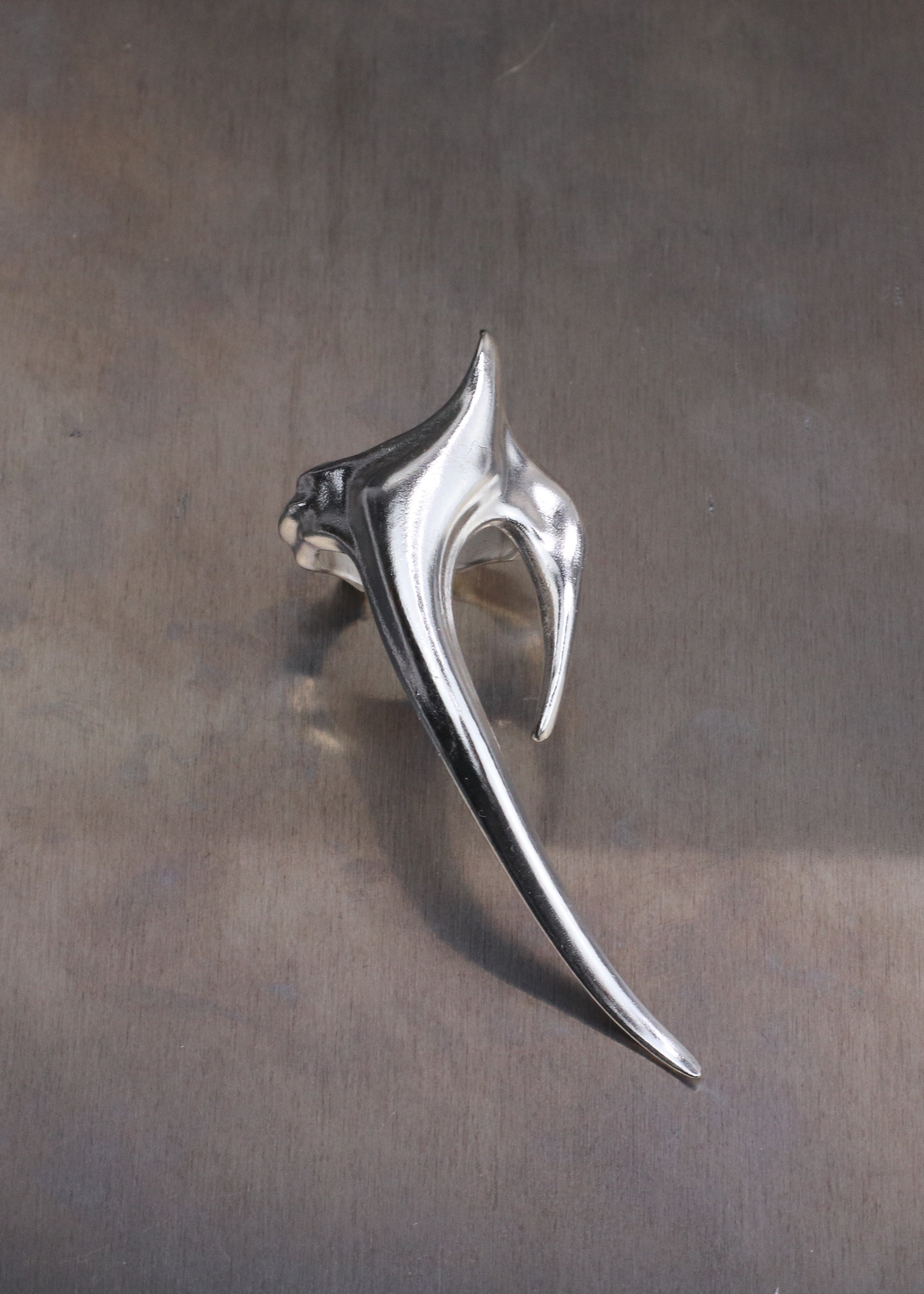 Sacral earcuff