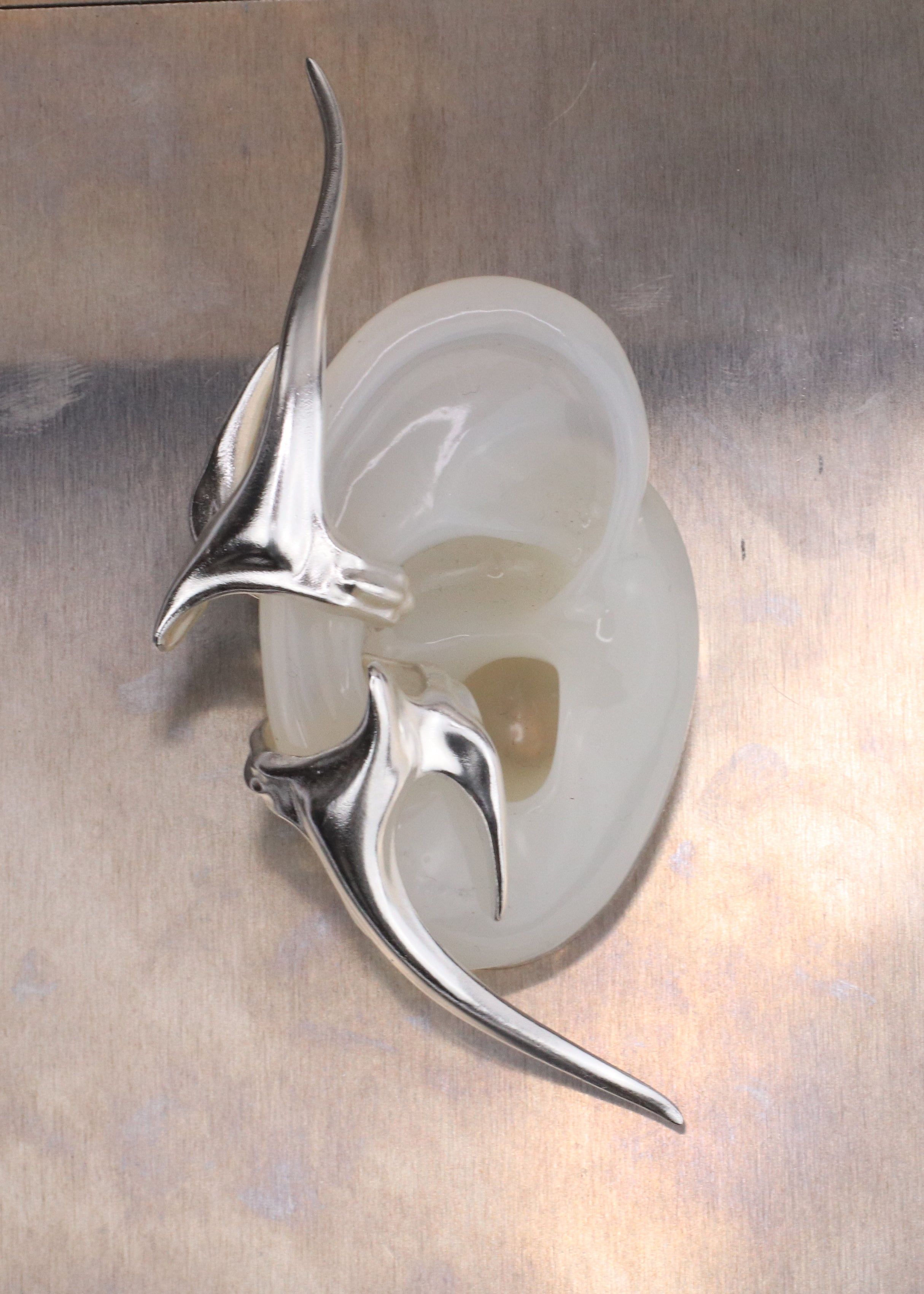 Sacral earcuff