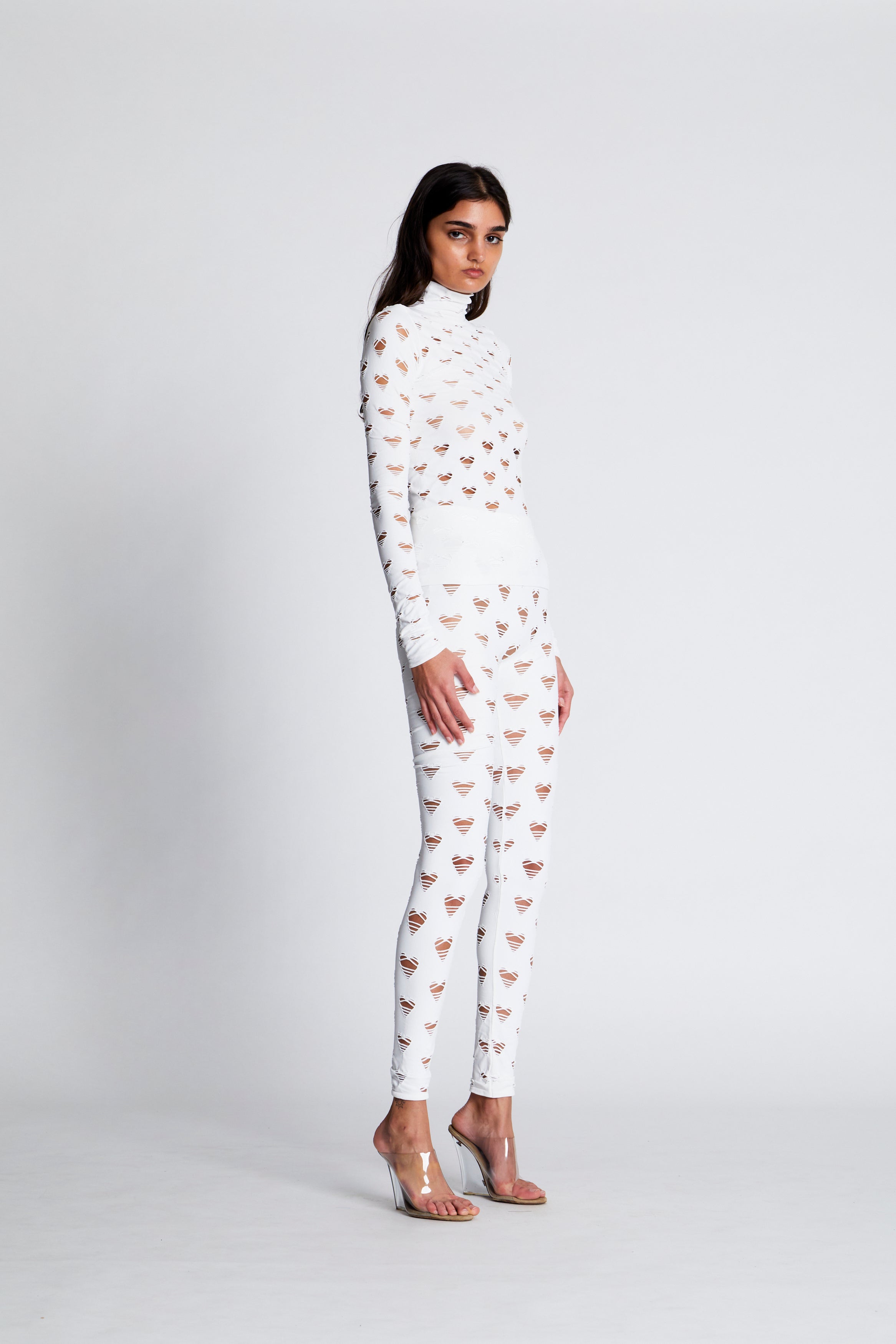 Perforated heart turtleneck