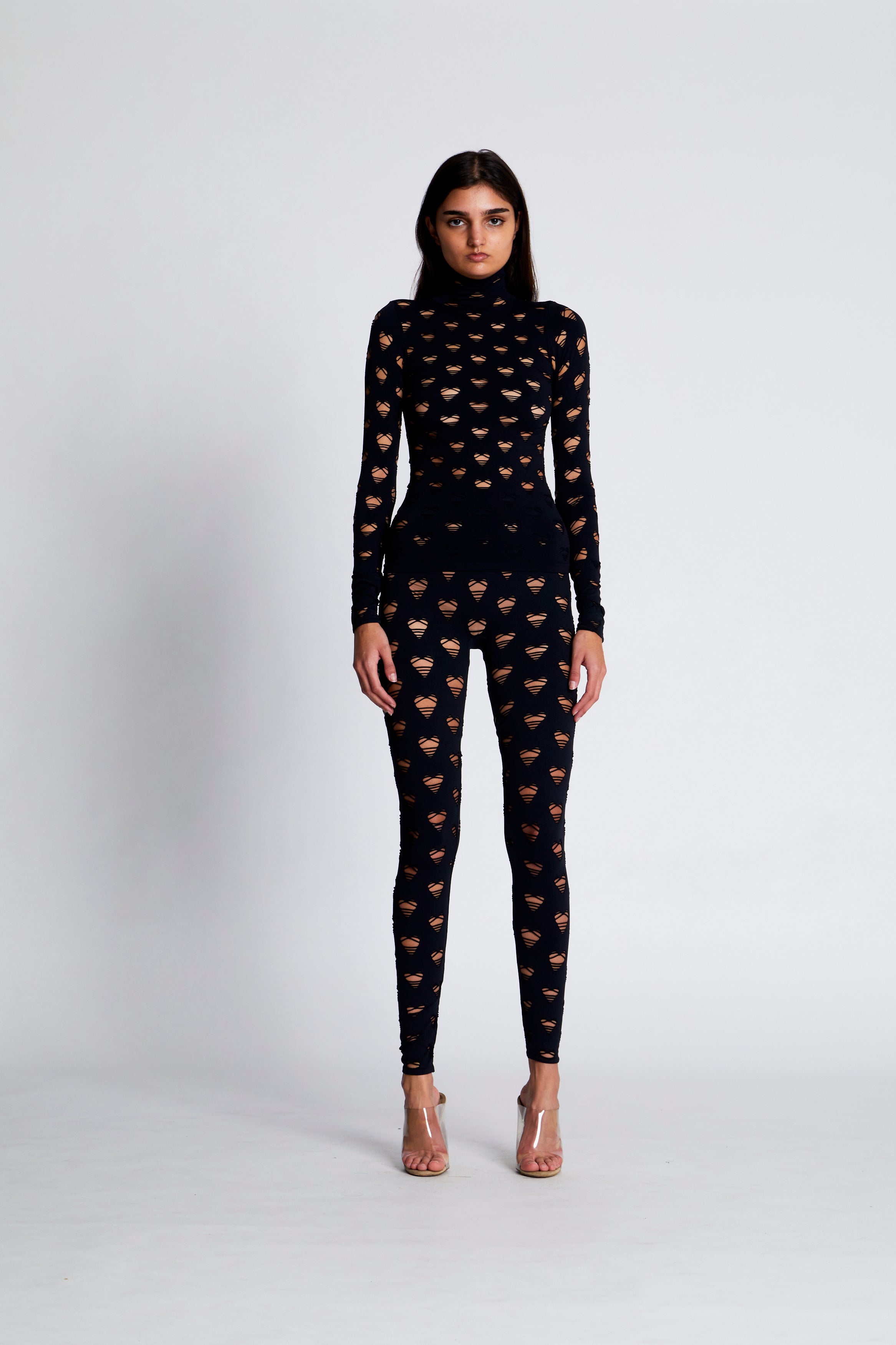 Perforated heart leggings
