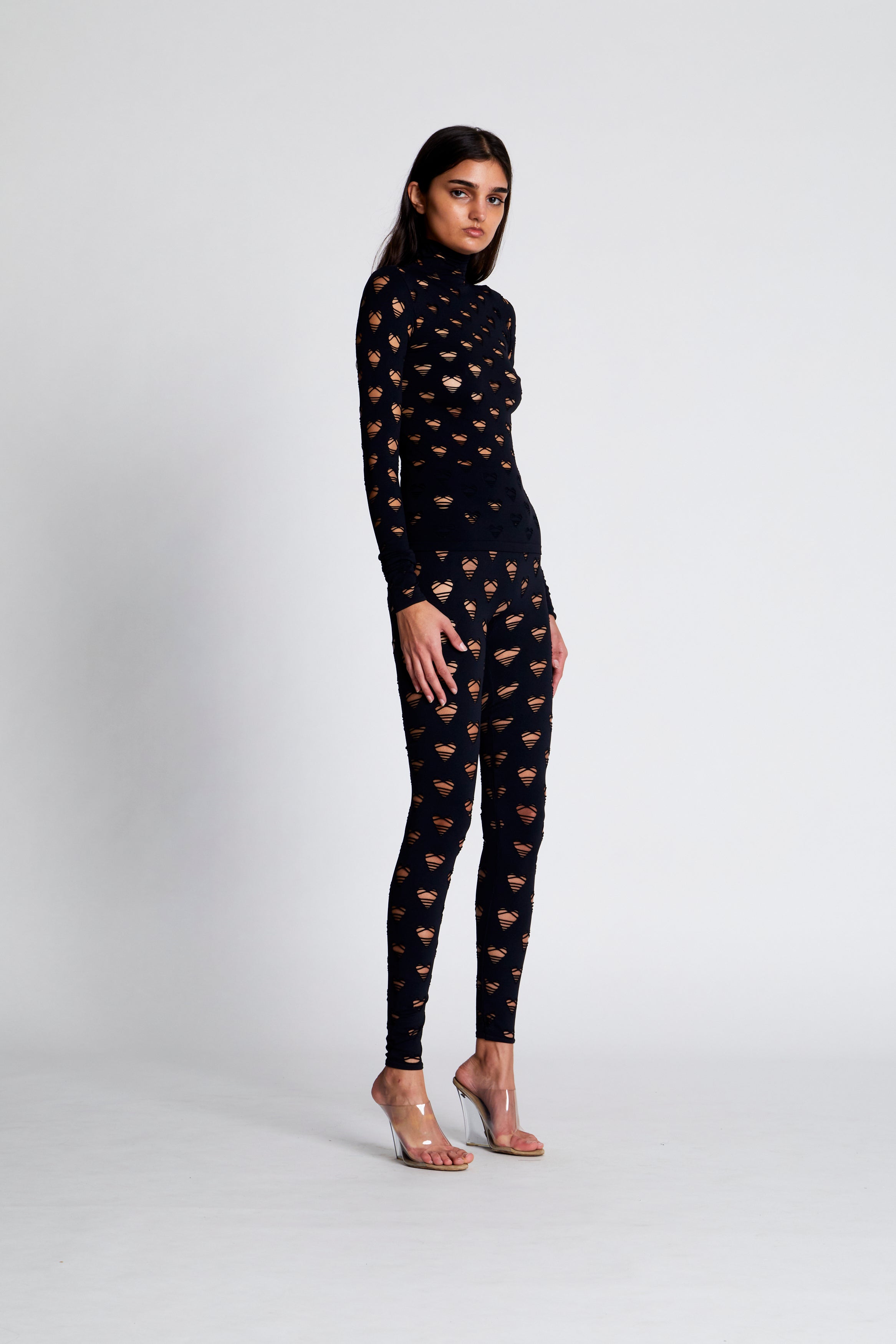 Perforated heart leggings