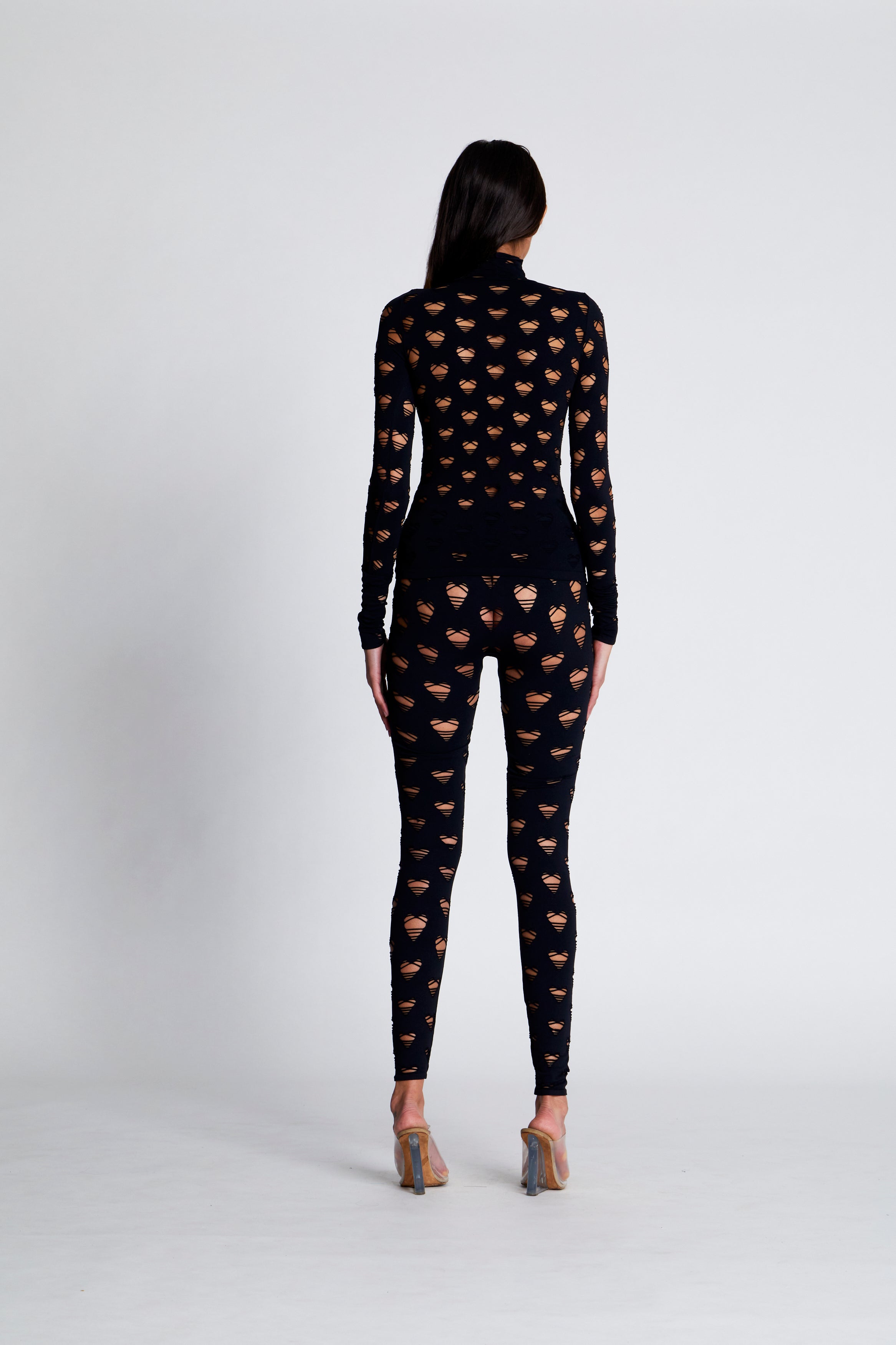 Perforated heart leggings