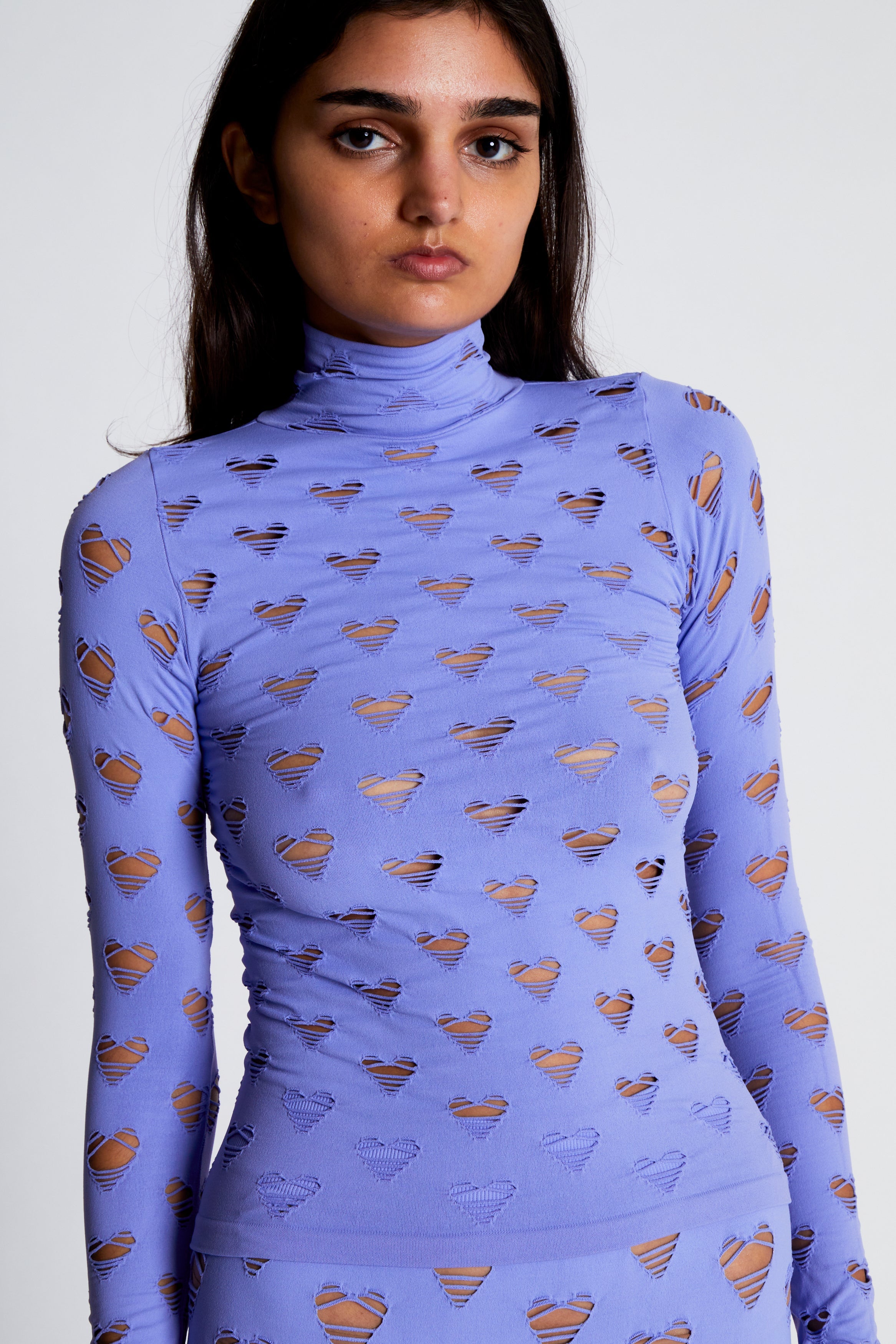 Perforated heart turtleneck